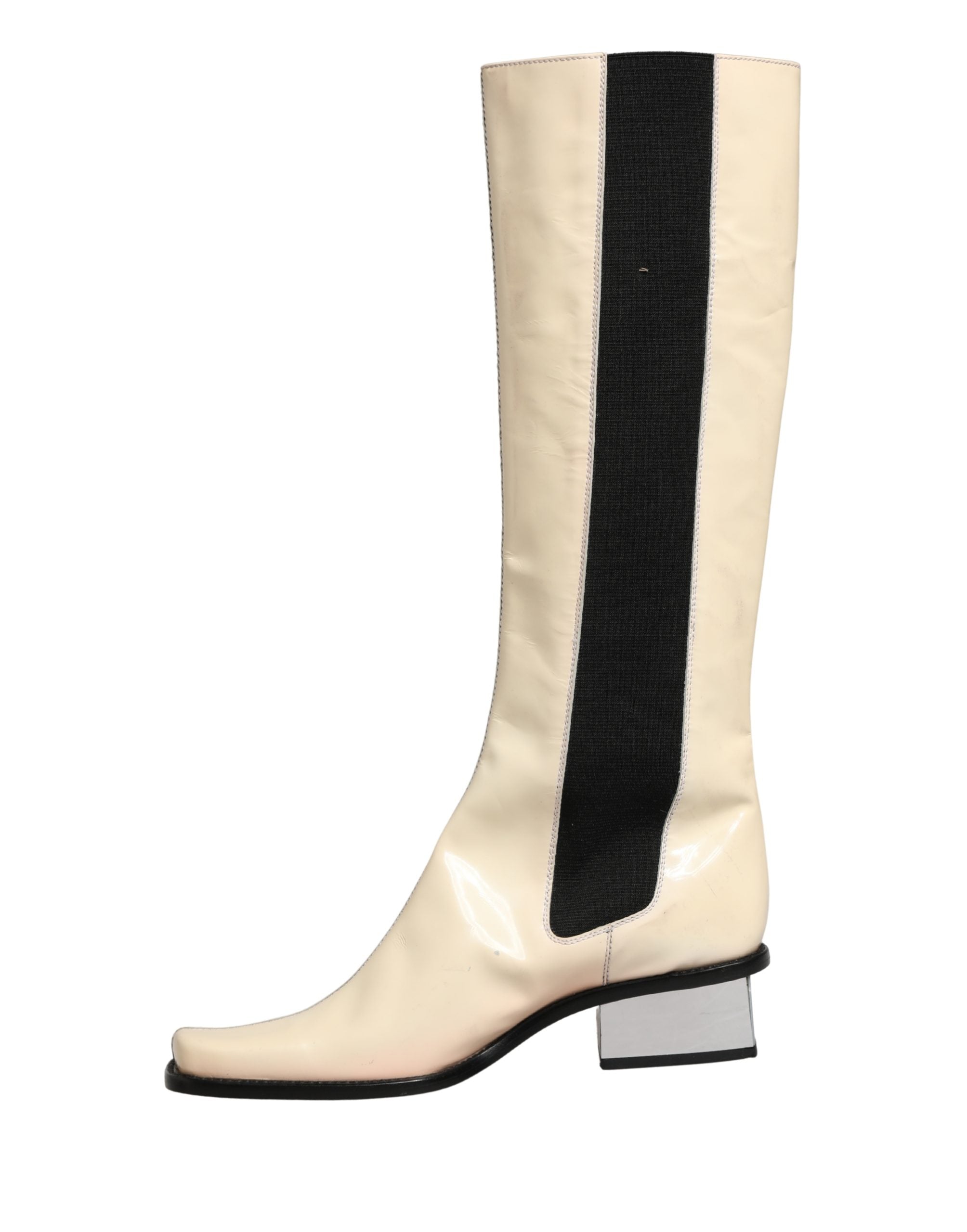 Bottes hautes en cuir blanc et noir de Dolce & Gabbana, chaussures élégantes en cuir pour femme.