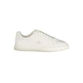 Sneakers blanches pour femmes de Calvin Klein en polyuréthane, vue de côté, avec semelle blanche et design épuré.