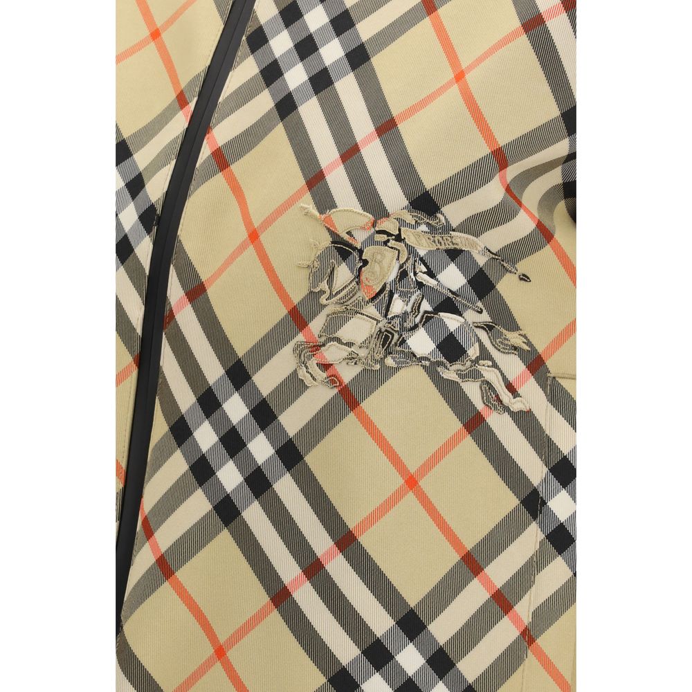 Veste longue beige en polyester de Burberry, vue de face, avec fermeture éclair et col classique.