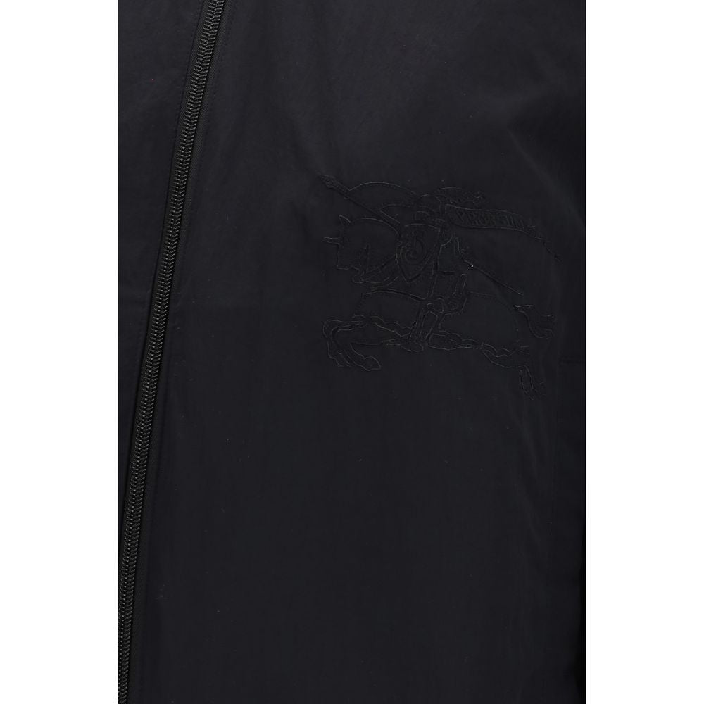 Veste longue en polyester beige de Burberry, coupe élégante et classique, avec détails de marque visibles.