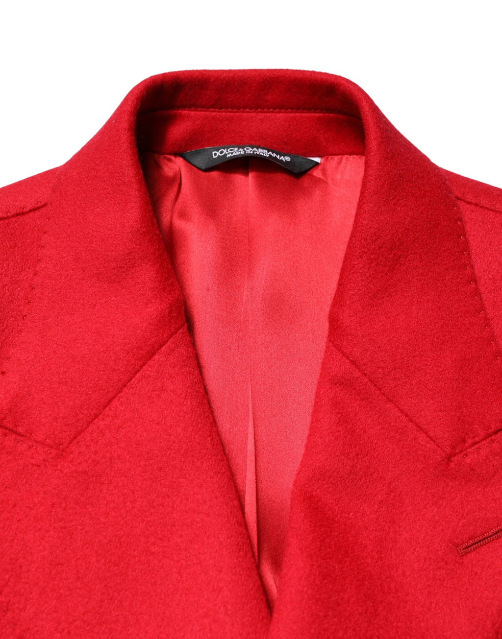 Manteau blazer en cachemire rouge Dolce & Gabbana, coupe slim fit, élégant et chaud, porté sur un fond neutre.