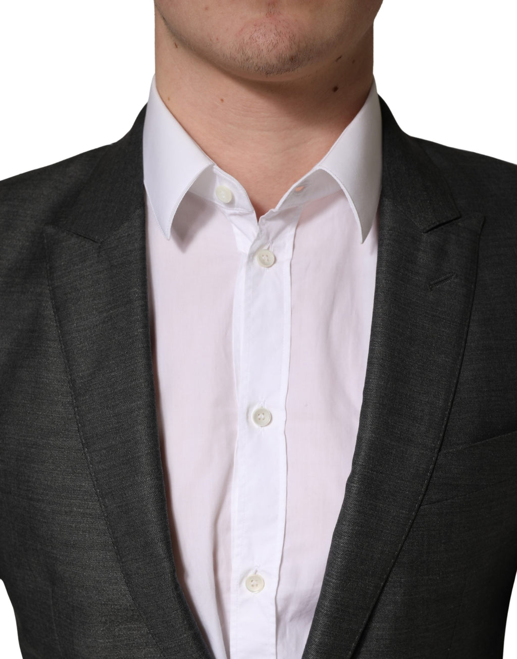 Manteau blazer gris foncé en laine Dolce & Gabbana, coupe slim ajustée, porté sur un mannequin.