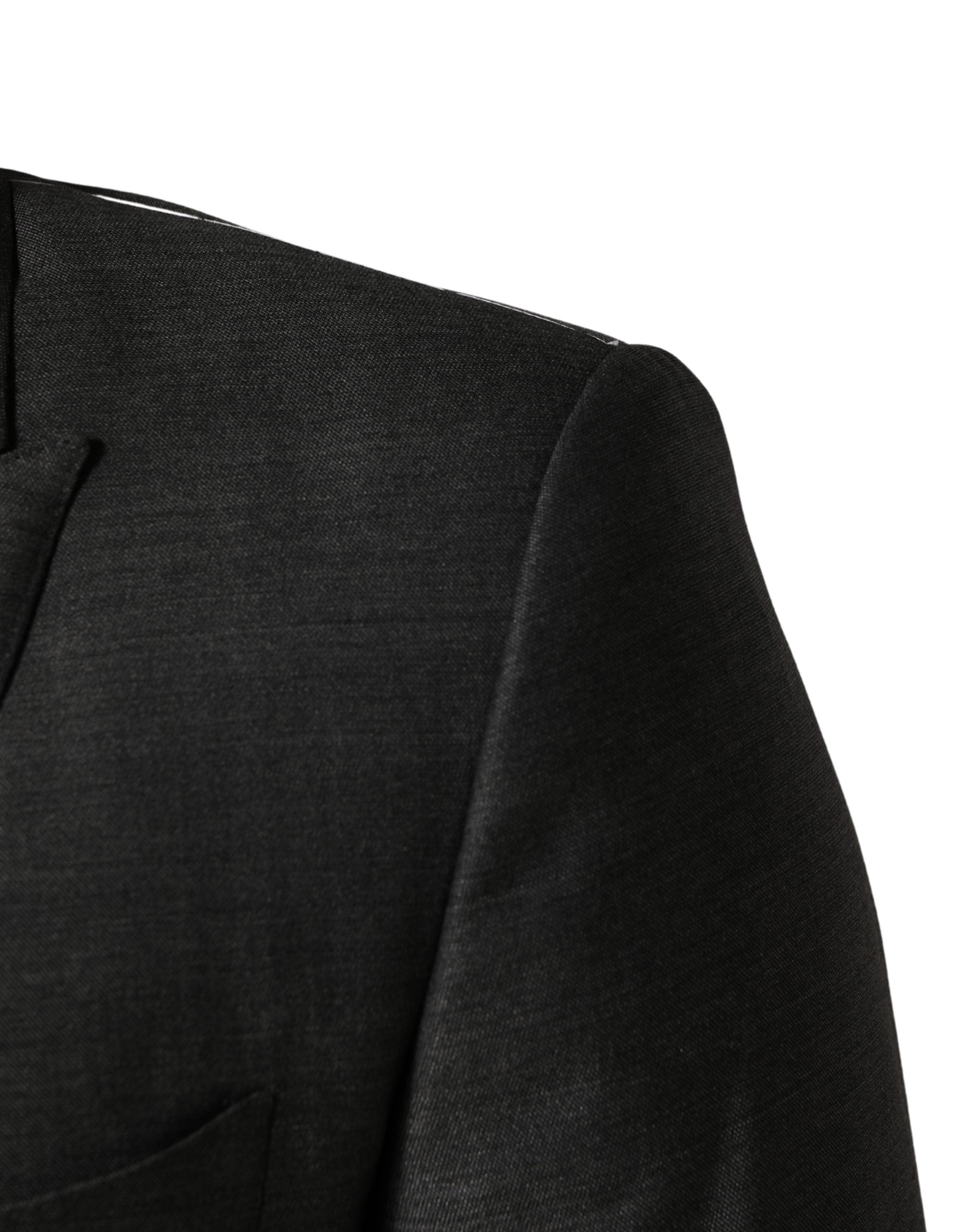 Veste blazer slim fit en laine gris foncé de Dolce & Gabbana, élégante et structurée, avec col classique et boutons.