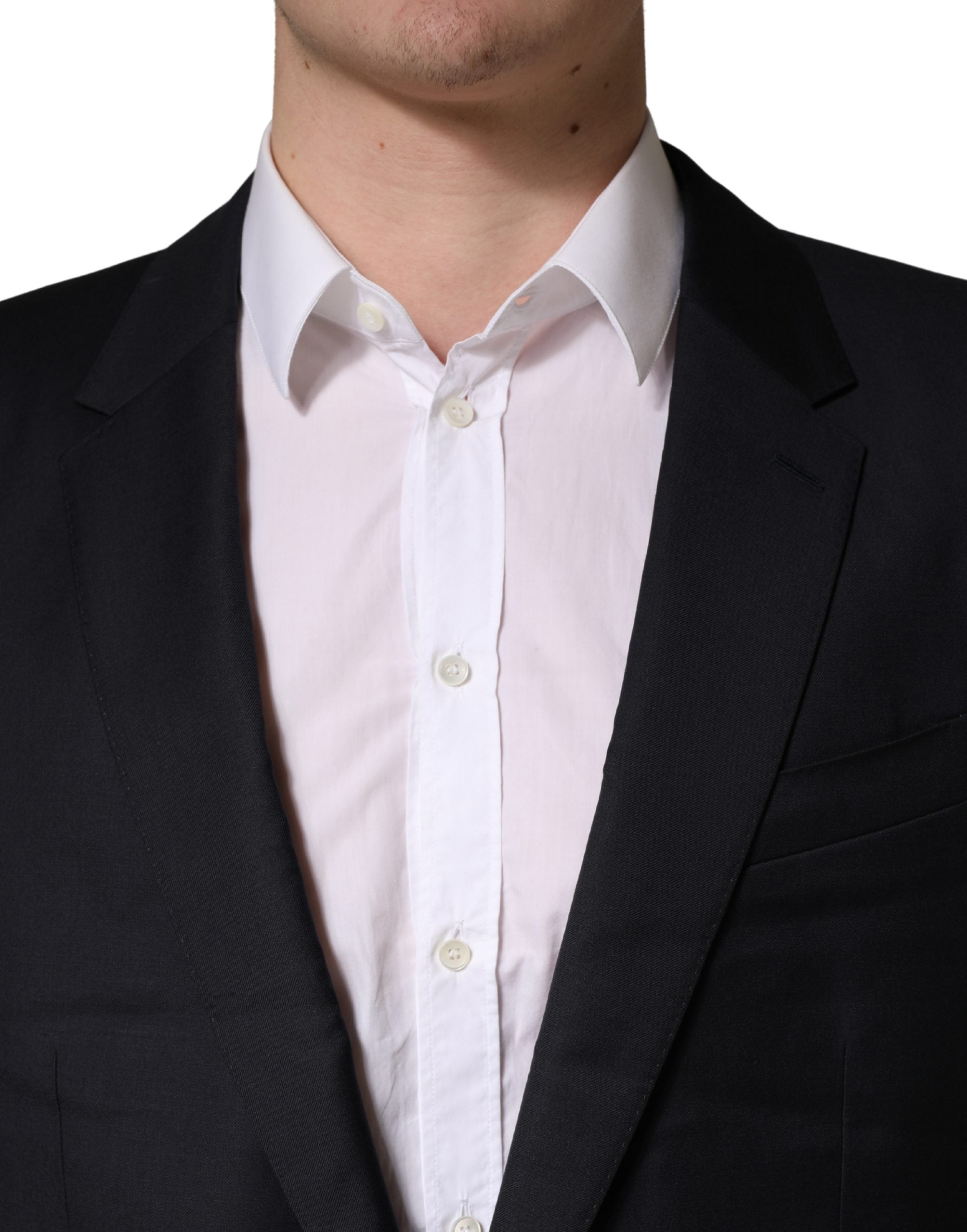 Manteau homme Dolce & Gabbana en laine noire, coupe slim, style blazer élégant, visible sur le mannequin.