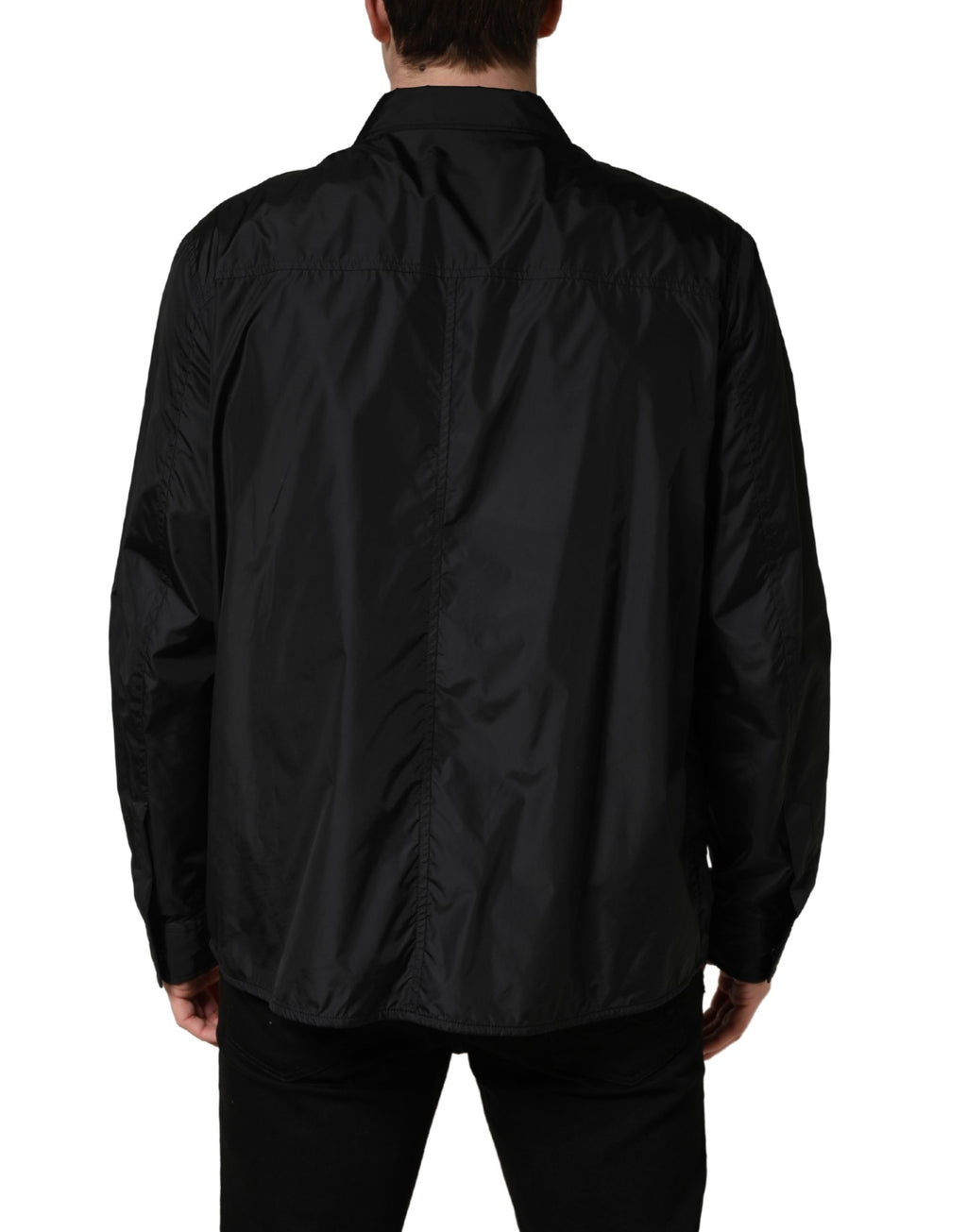 Chemise blazer noire Dolce & Gabbana à logo en plaque, manches longues, style élégant et moderne.