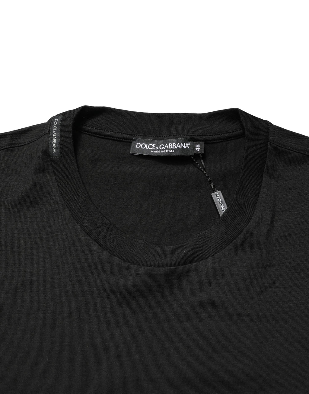 Débardeur noir Dolce & Gabbana à col rond, sans manches, en coton, porté sur mannequin.