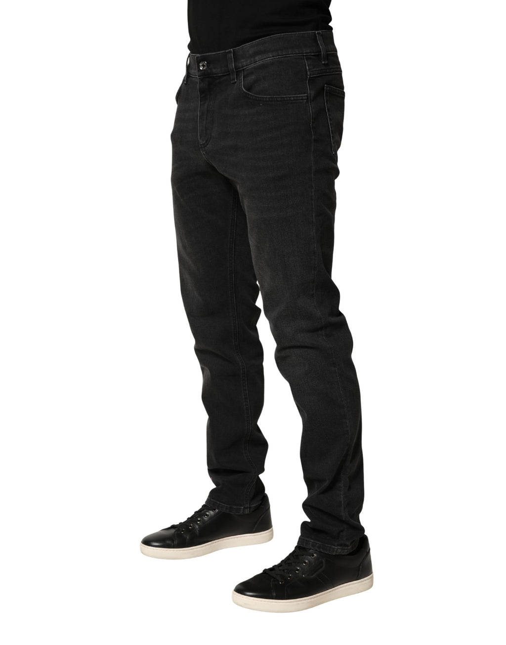 Jeans skinny en coton stretch noir Dolce & Gabbana, coupe régulière, denim élégant, visible sur le mannequin.