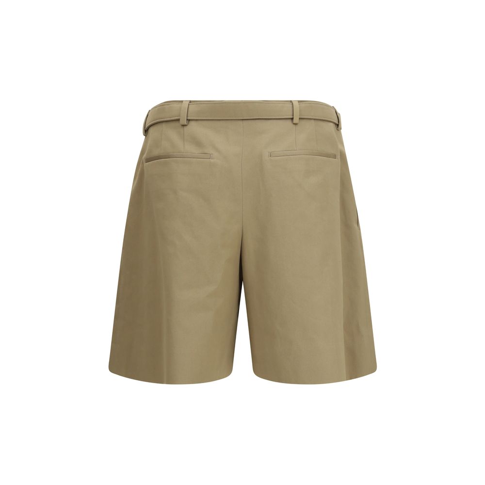 Shorts bermuda en coton beige de la marque Saint Laurent, vue de face avec détails de la coupe et de la texture du tissu.