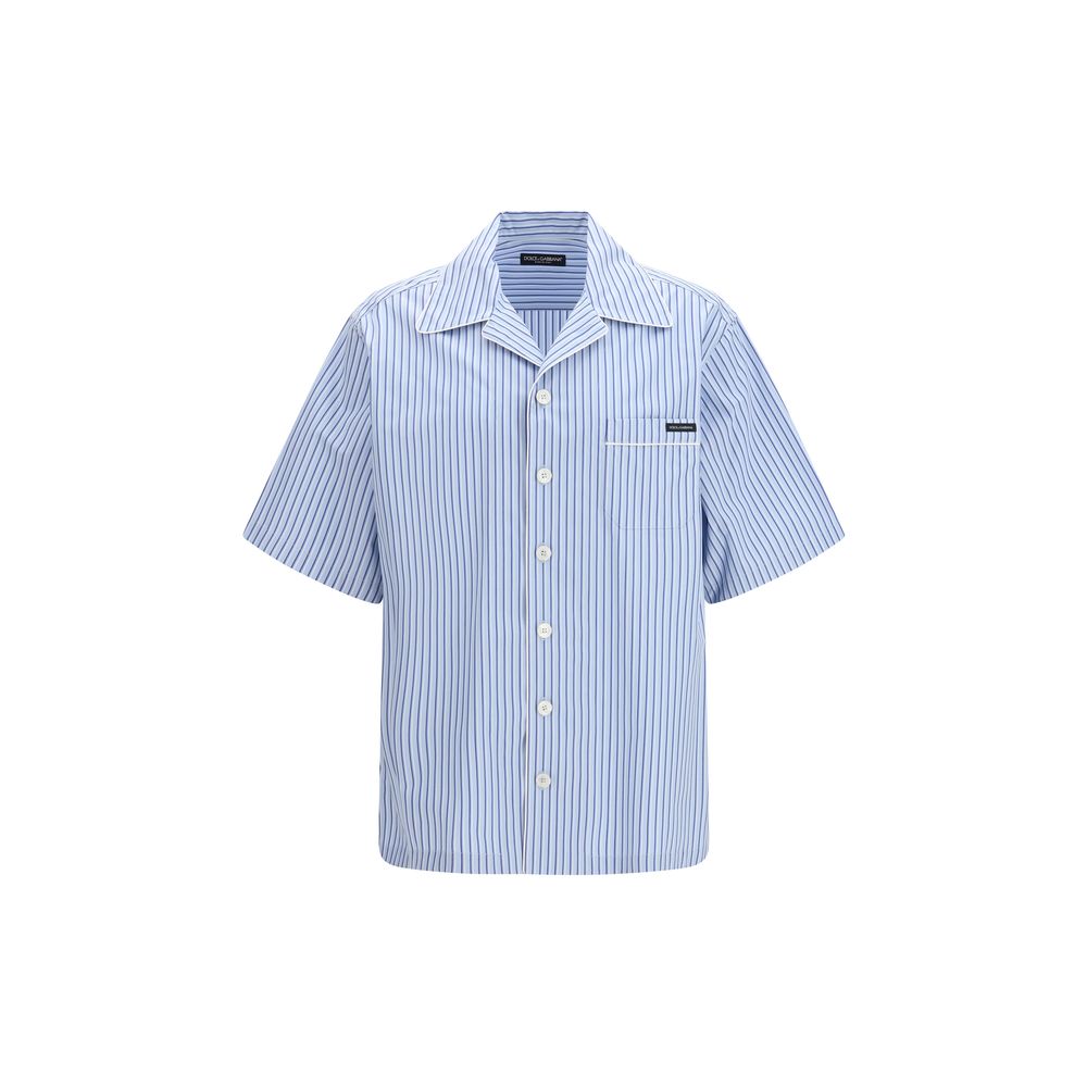 Chemise Dolce & Gabbana en coton bleu à manches courtes, style élégant et décontracté, visible sur l'image.