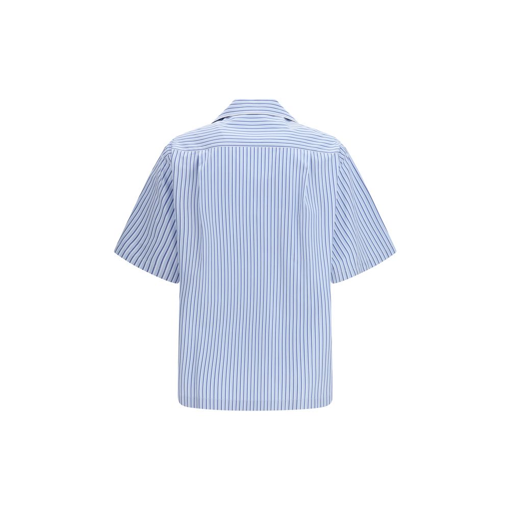 Chemise à manches courtes en coton bleu Dolce & Gabbana, vue de face, avec col classique et détails élégants.