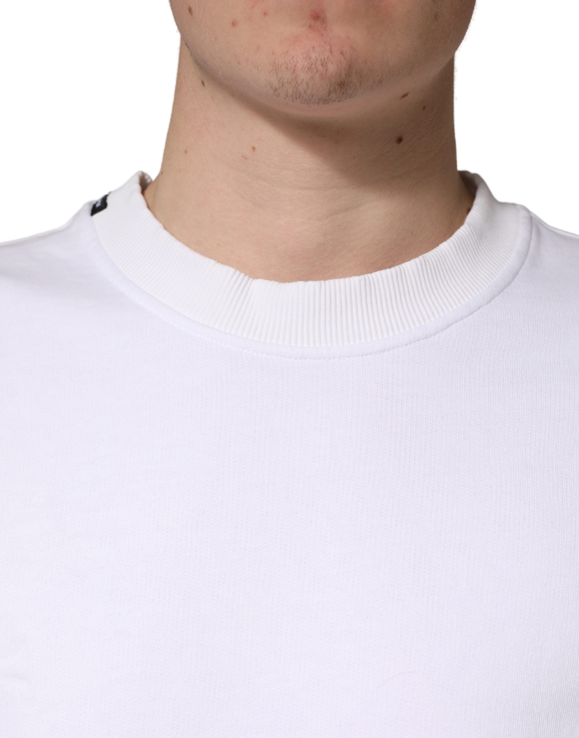 Sweat-shirt blanc en coton à col rond de Dolce & Gabbana, doux et confortable, porté ou posé sur une surface.