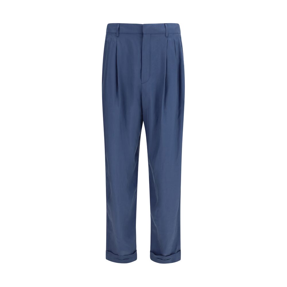 Pantalon en soie bleue de Saint Laurent pour femme, coupe élégante et tissu fluide, porté sur un mannequin.