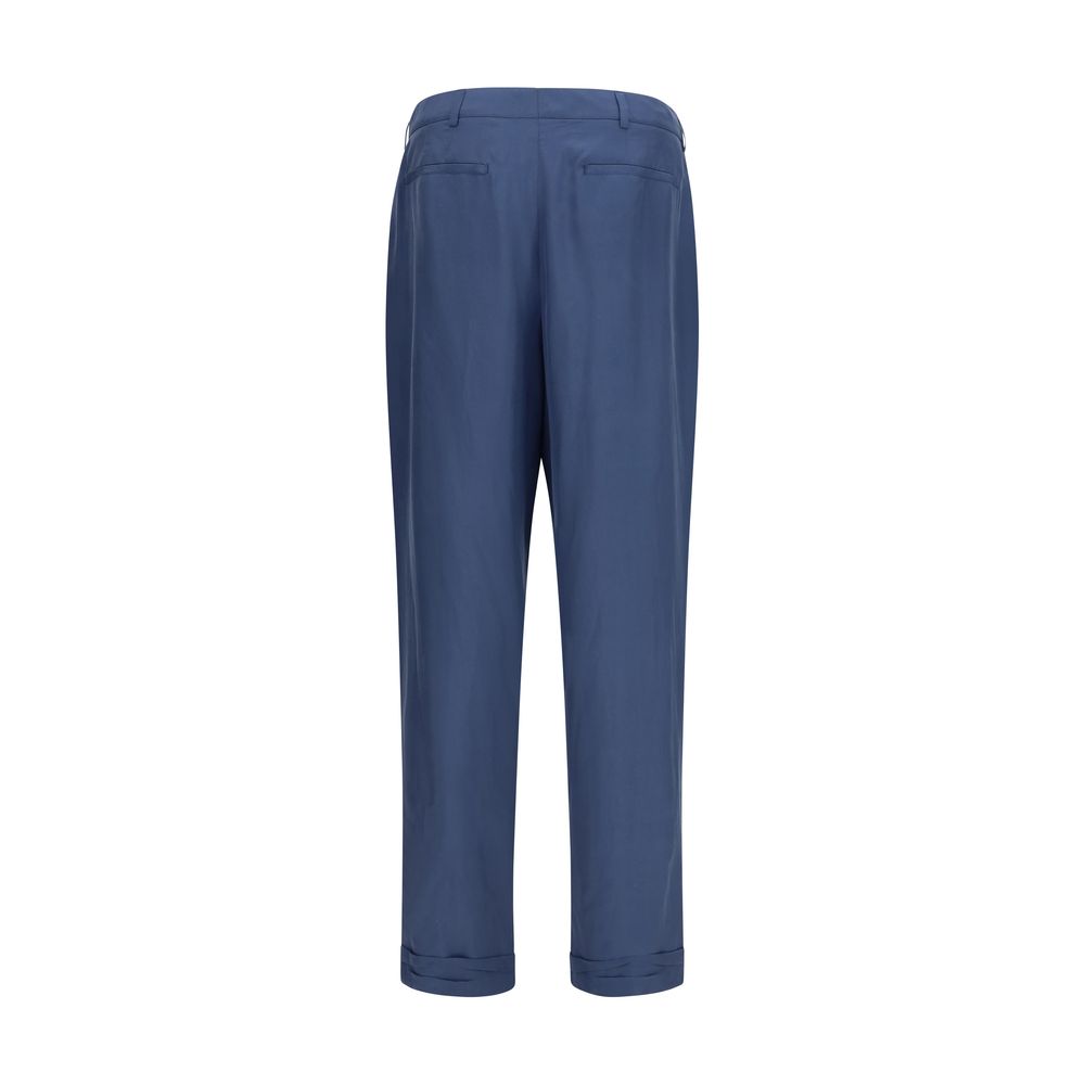 Pantalon habillé en soie bleue de Saint Laurent, élégant et fluide, pour femme, avec coupe sophistiquée.