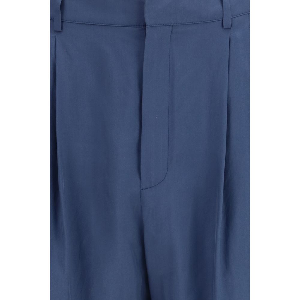 Pantalon en soie bleu de la marque Saint Laurent, coupe élégante et design sophistiqué pour femme.