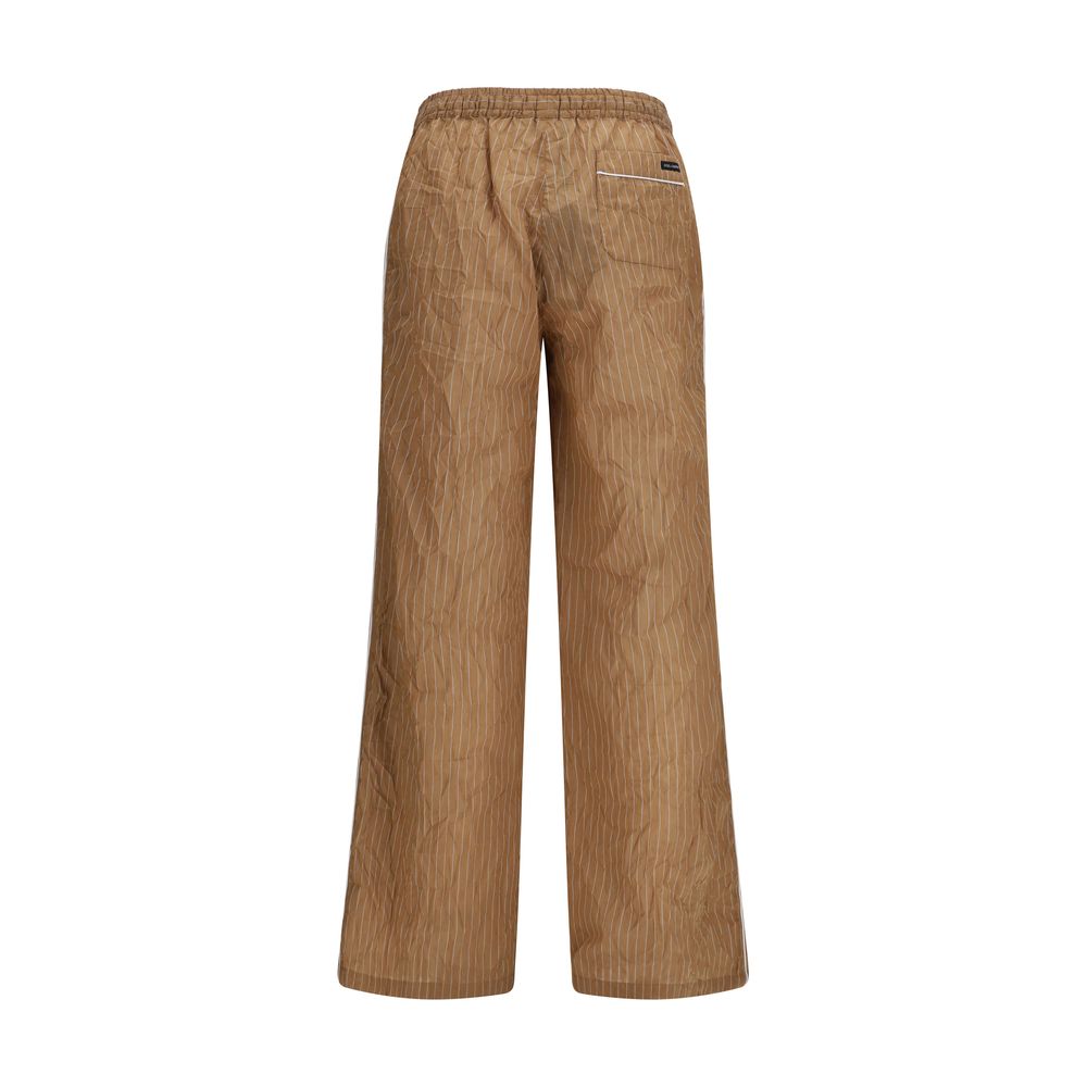Pantalon décontracté en lin marron de Dolce & Gabbana, style casual, vue de face sur un modèle.