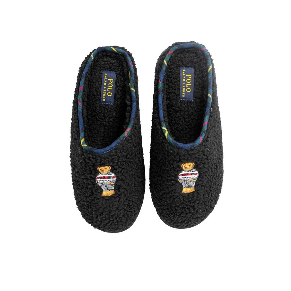 Pantoufles en coton noir Ralph Lauren, confortables et élégantes, avec logo Ralph Lauren visible sur le dessus.