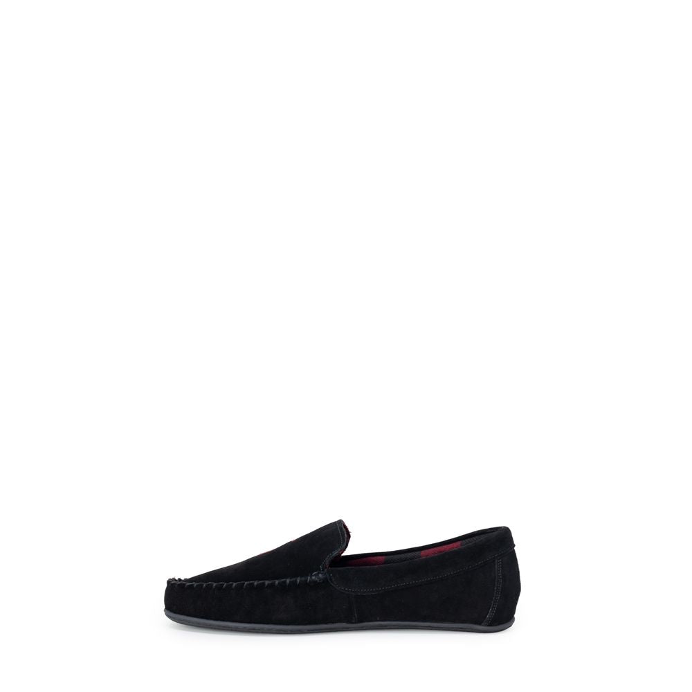 Chaussons en fausse fourrure noire Ralph Lauren pour un confort élégant et chaud.