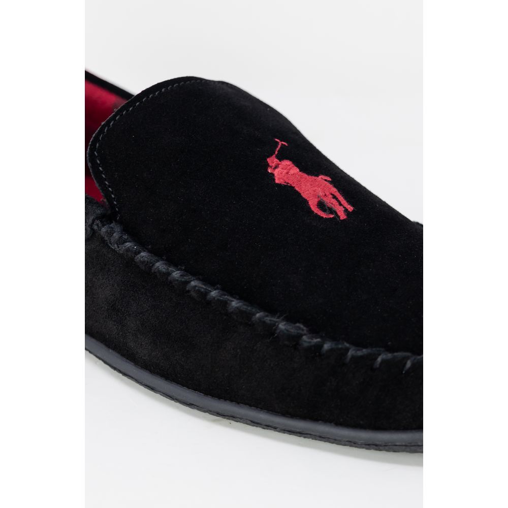 Pantoufles Ralph Lauren en fausse fourrure noire, confortables et douces, pour un style élégant et chaud.