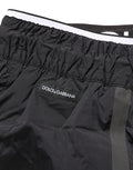 Maillot de bain Dolce & Gabbana en nylon noir avec taille élastique, style slip de natation pour homme.