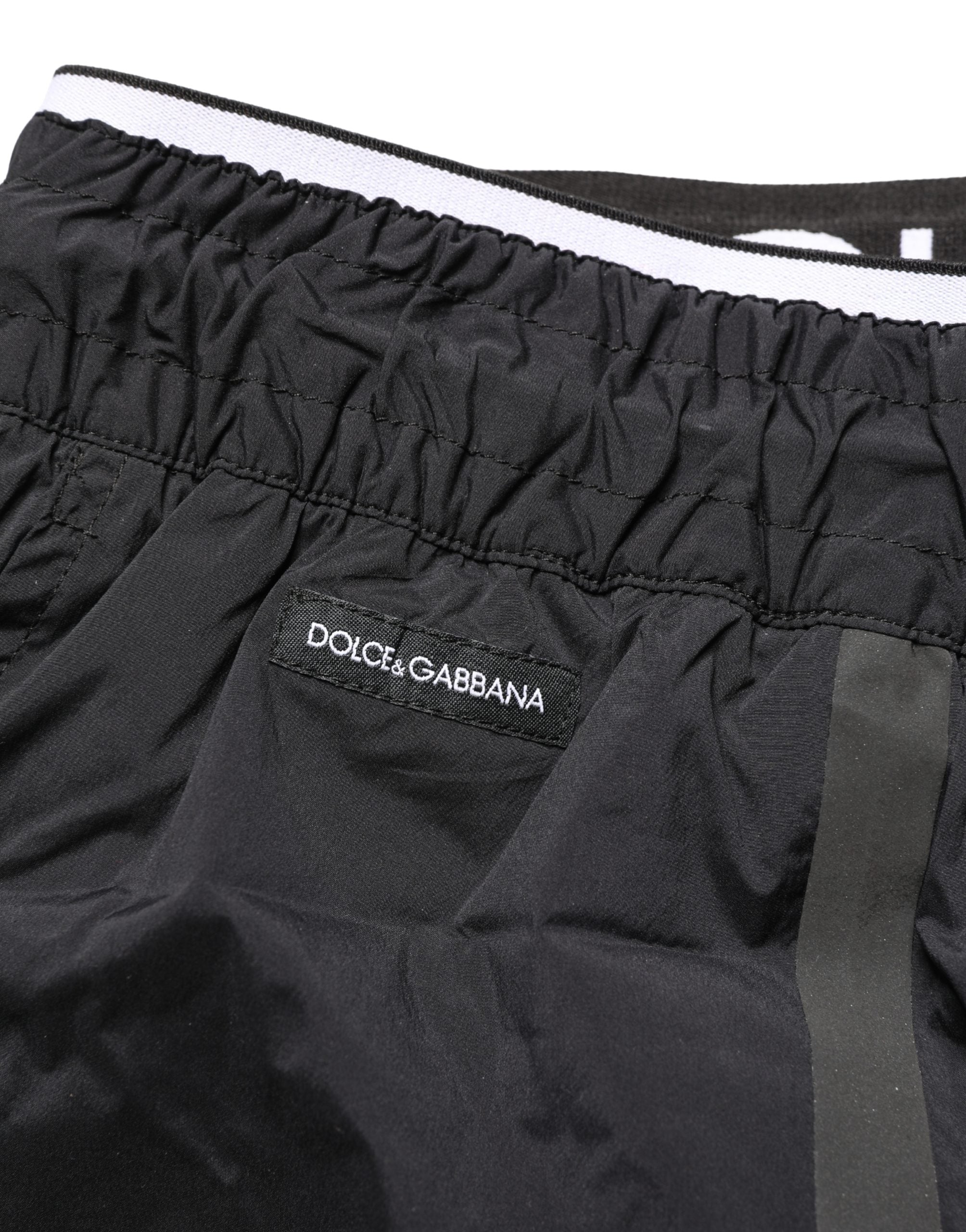 Maillot de bain Dolce & Gabbana en nylon noir avec taille élastique, style slip de natation pour homme.