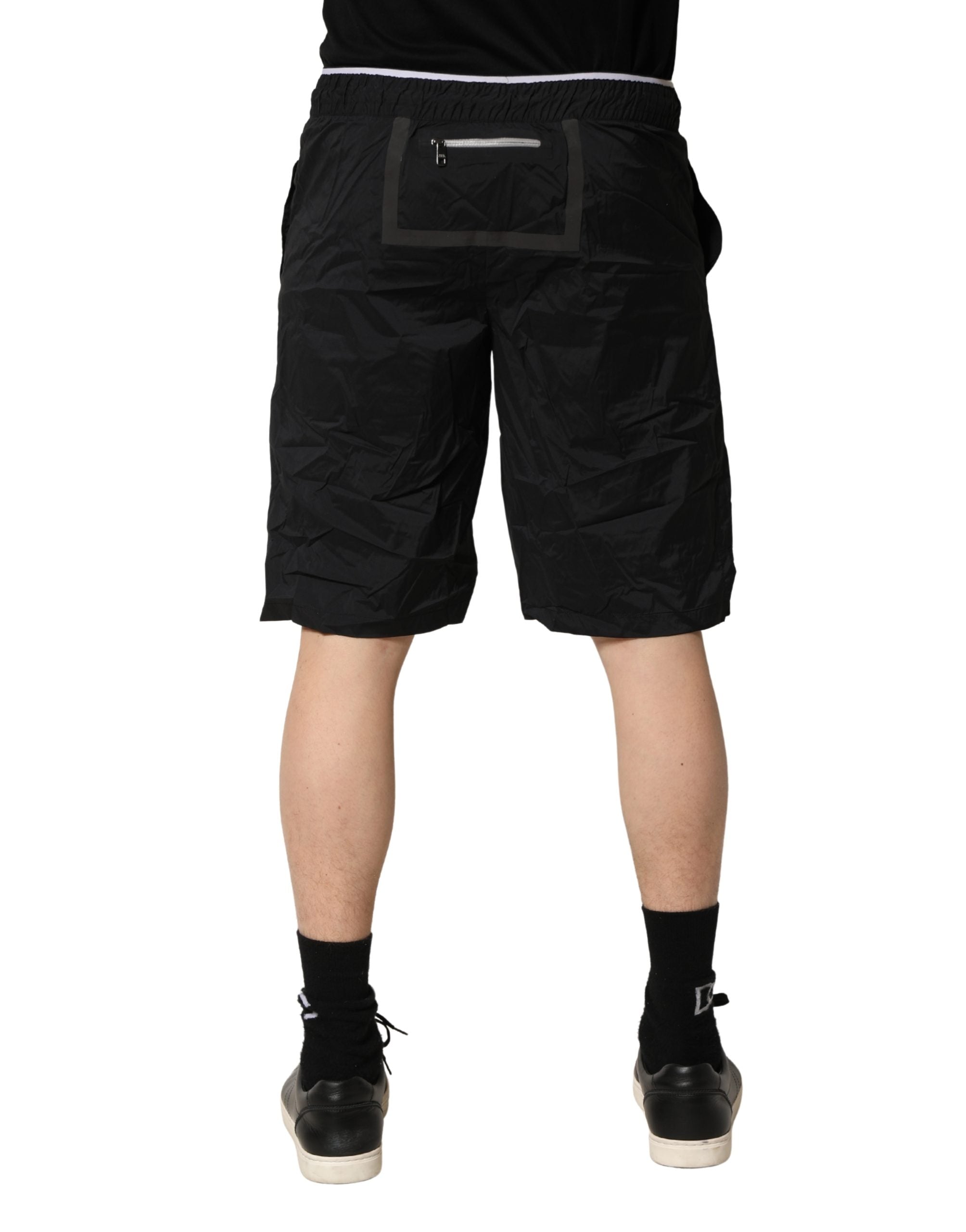 Shorts de bain Dolce & Gabbana en nylon noir avec taille élastique, parfaits pour la plage ou la piscine.