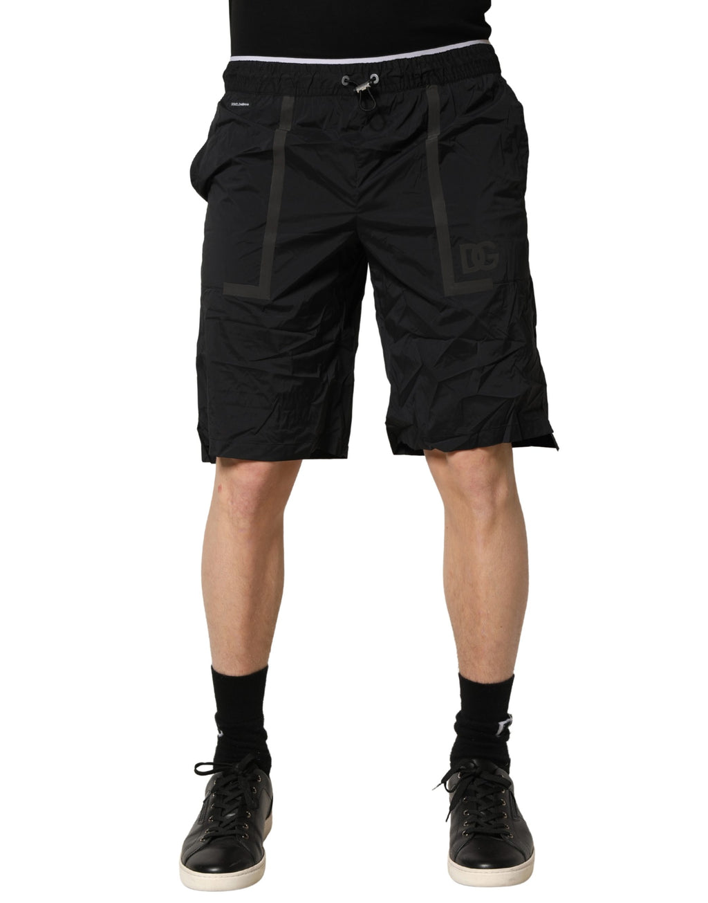 Short de bain noir en nylon Dolce & Gabbana avec taille élastique, logo discret, idéal pour la plage ou la piscine.