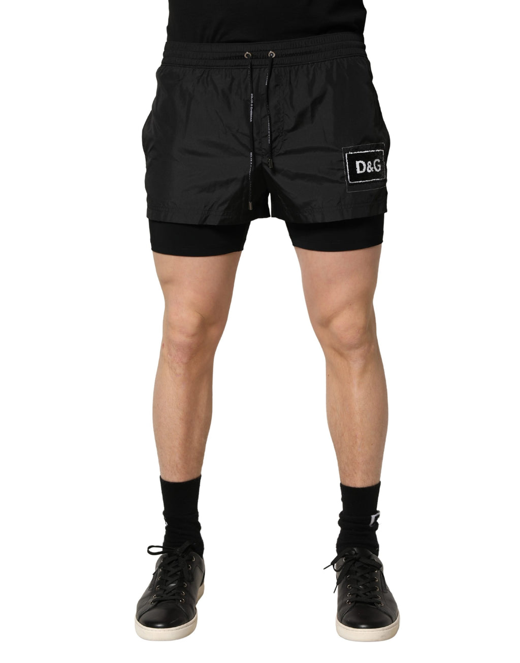 Shorts de bain pour homme Dolce & Gabbana en polyester noir avec cordon de serrage, style décontracté et confortable.