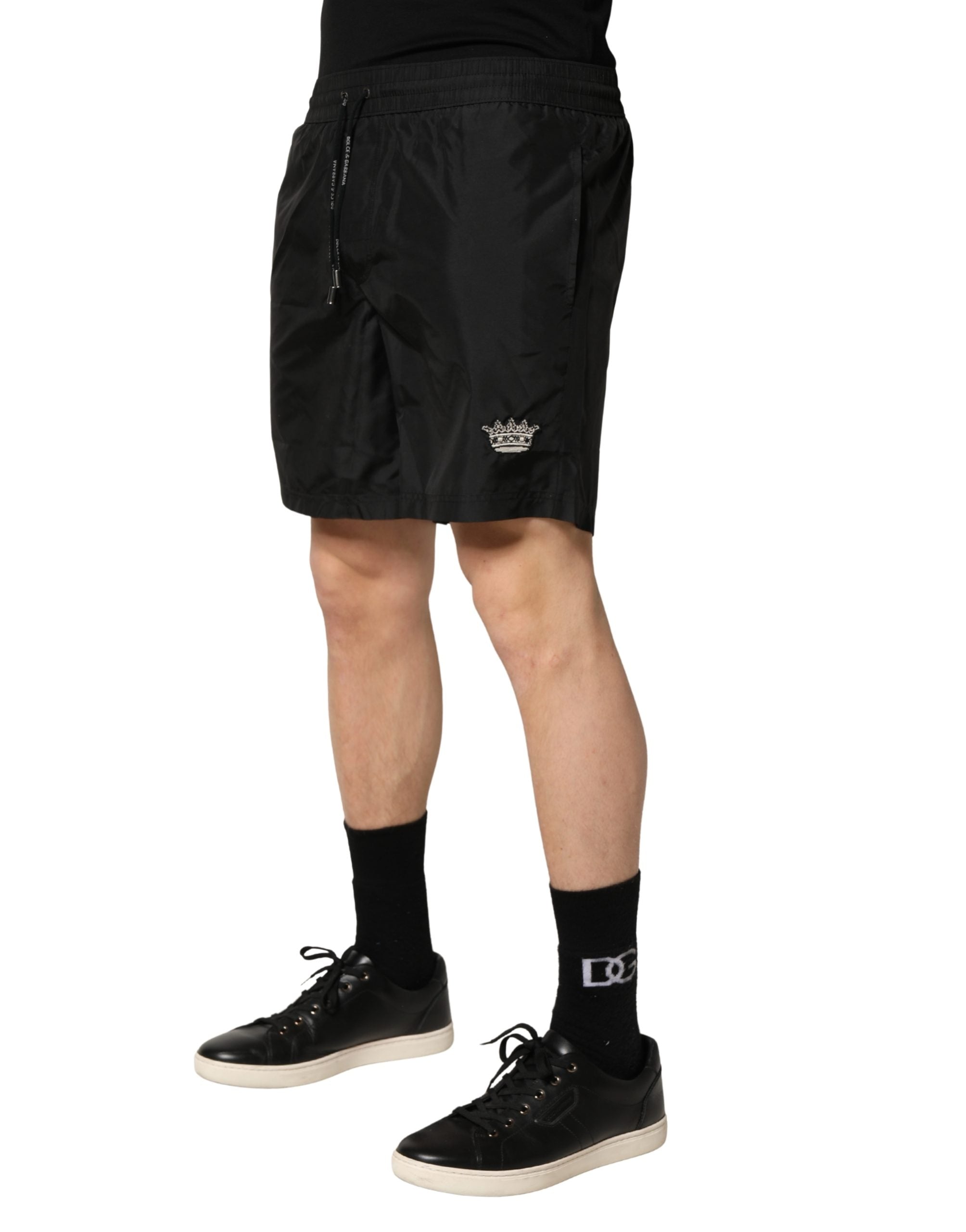Shorts de bain pour homme Dolce & Gabbana en polyester noir avec cordon de serrage, style décontracté et confortable.