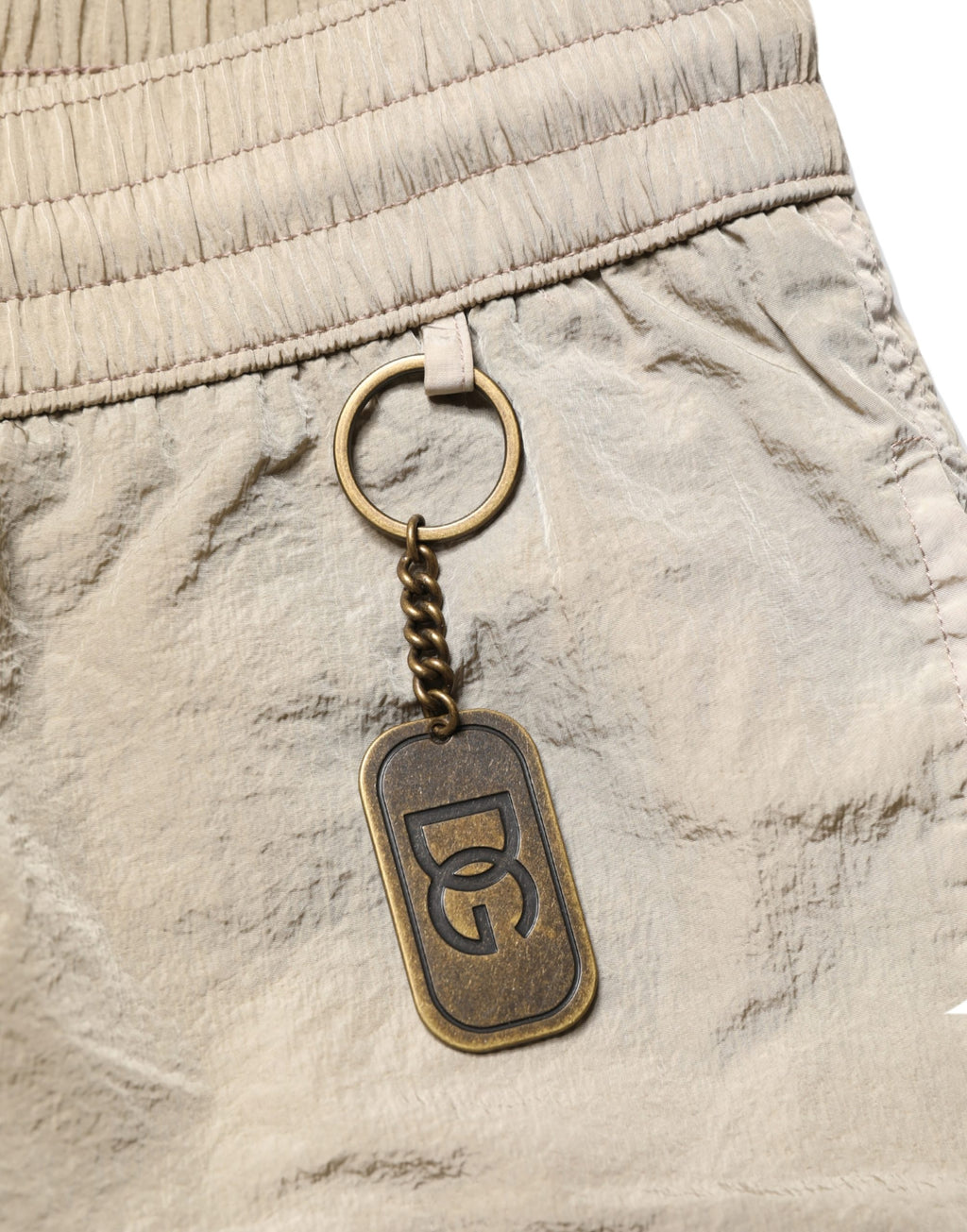 Maillot de bain homme Dolce & Gabbana en nylon marron avec cordon de serrage, short de baignade élégant et confortable.