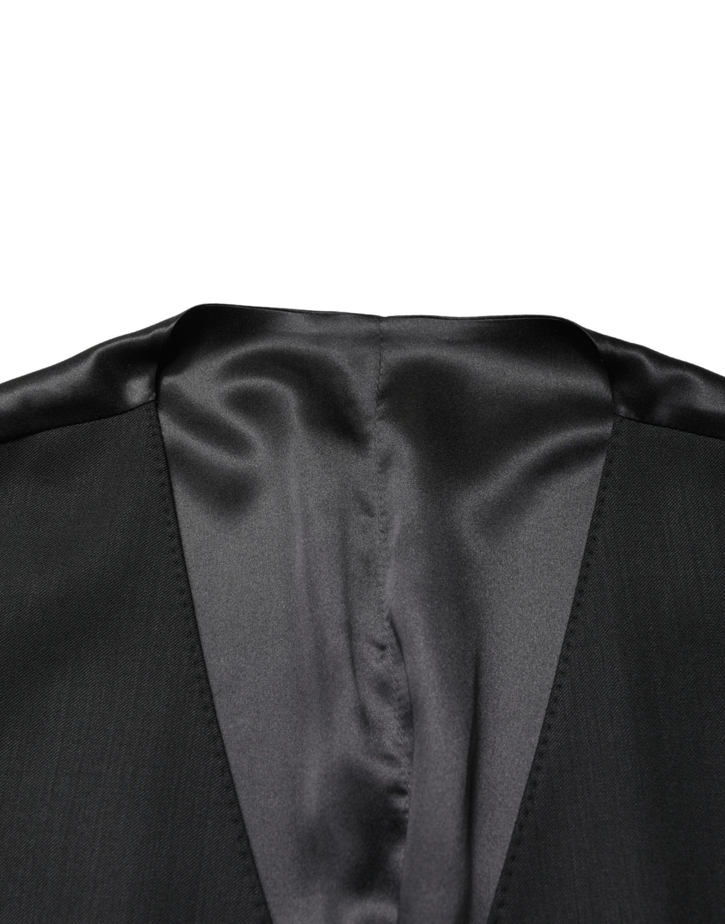 Gilet homme en laine noire Dolce & Gabbana à boutonnière simple, détail élégant et coupe ajustée.