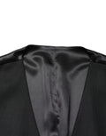 Gilet homme en laine noire Dolce & Gabbana à boutonnière simple, détail élégant et coupe ajustée.