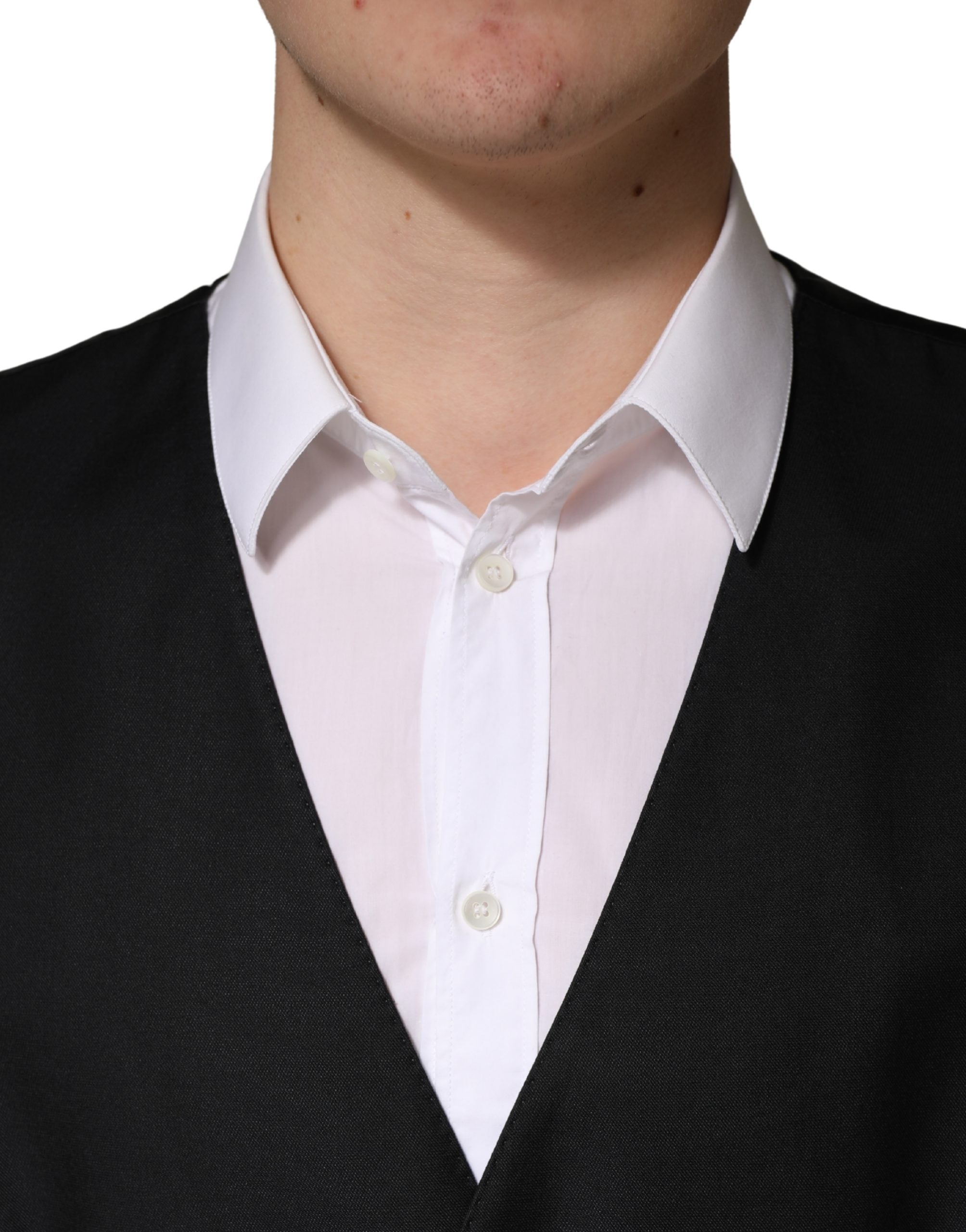 Gilet homme en laine noire Dolce & Gabbana à boutonnière simple, élégance classique et coupe ajustée.