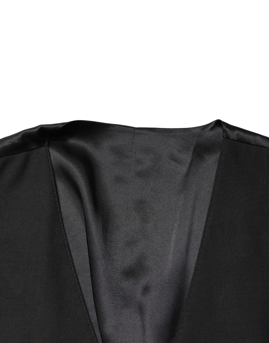 Gilet homme en laine noire Dolce & Gabbana à col châle, coupe simple, fermoir à boutons sur l'avant.