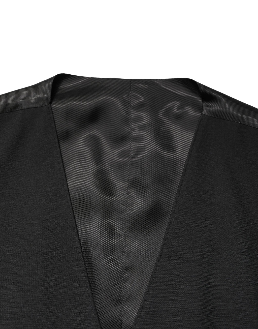 Gilet homme noir en laine Dolce & Gabbana, à une seule rangée de boutons, style élégant et moderne.
