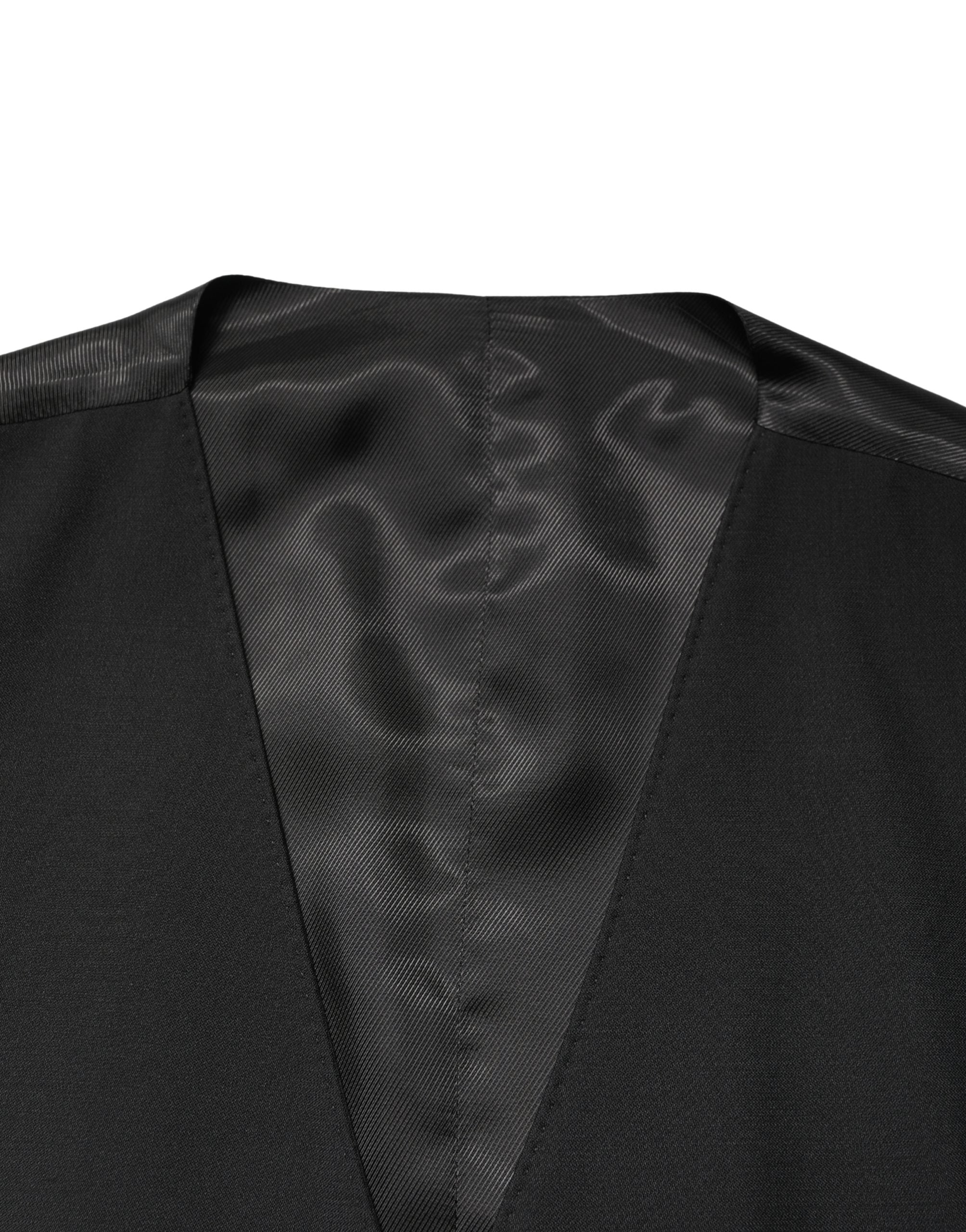 Gilet homme noir en laine Dolce & Gabbana, à une seule rangée de boutons, style élégant et moderne.