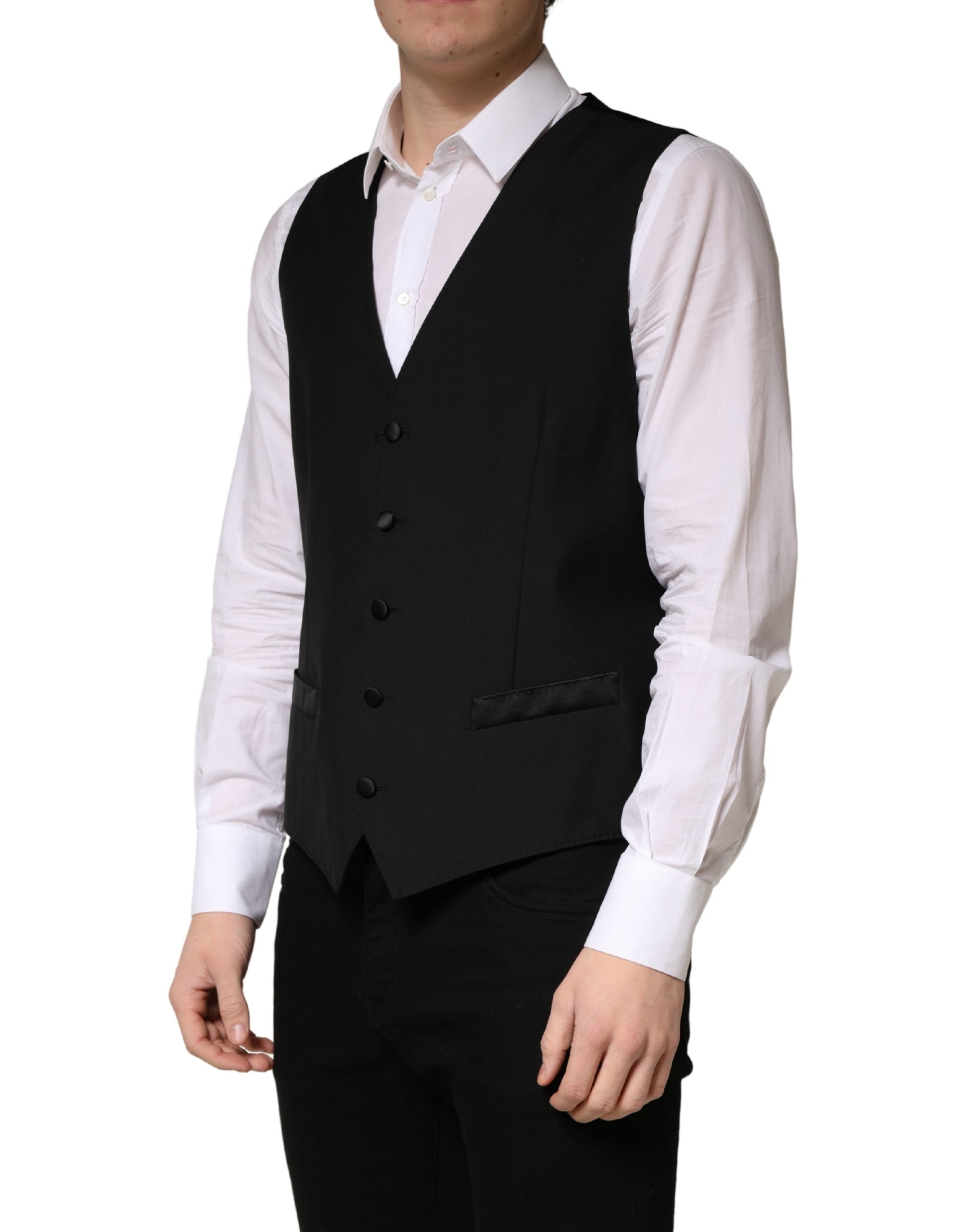 Gilet homme Dolce & Gabbana en laine noire, à simple boutonnage et coupe élégante, porté sur un fond neutre.