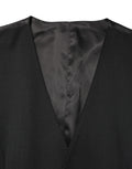 Gilet homme en laine noire Dolce & Gabbana, croisé simple, sans manches, détails élégants, porté sur un mannequin.