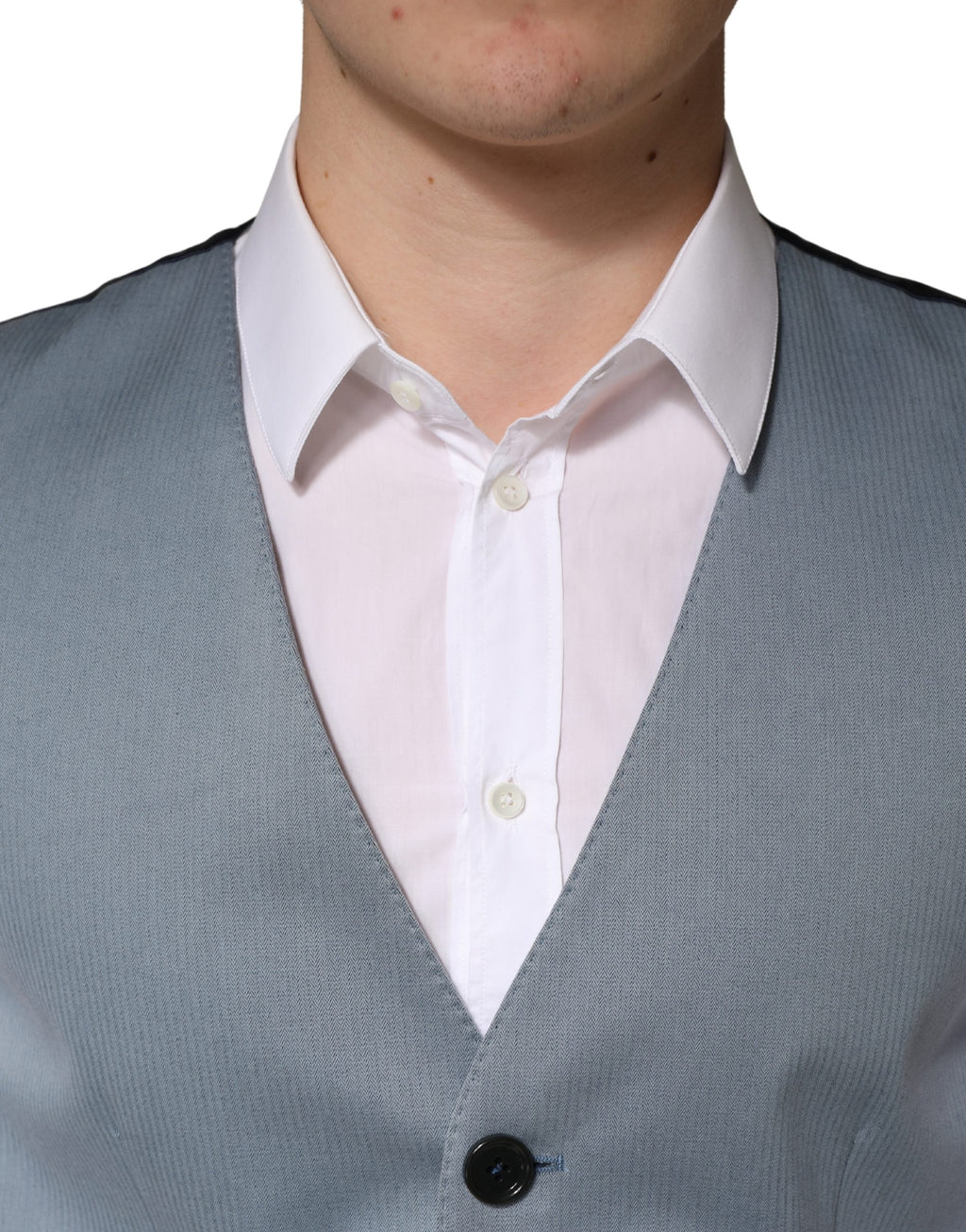 Gilet homme en laine gris Dolce & Gabbana, coupe croisée simple, détail ajusté et élégant, porté sur un fond neutre.