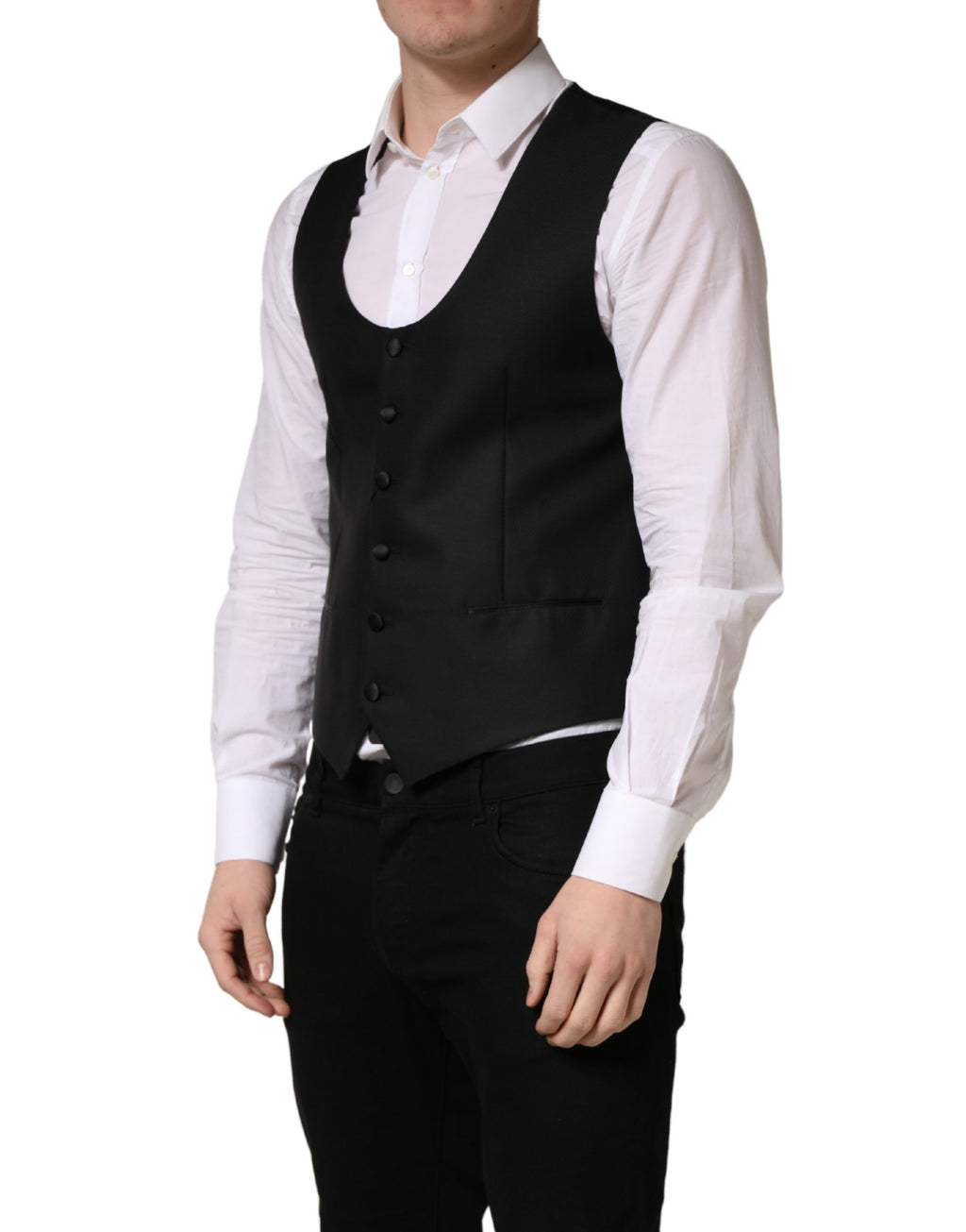 Gilet en laine noir Dolce & Gabbana à un seul bouton, coupe ajustée et style élégant pour hommes.