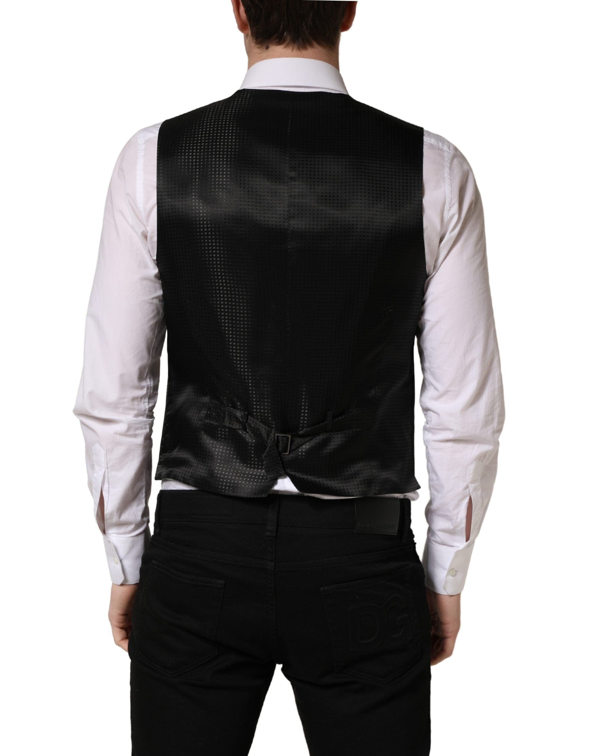 Gilet en laine noir Dolce & Gabbana à simple boutonnage, élégant et ajusté, pour homme ou femme, visible en gros plan.