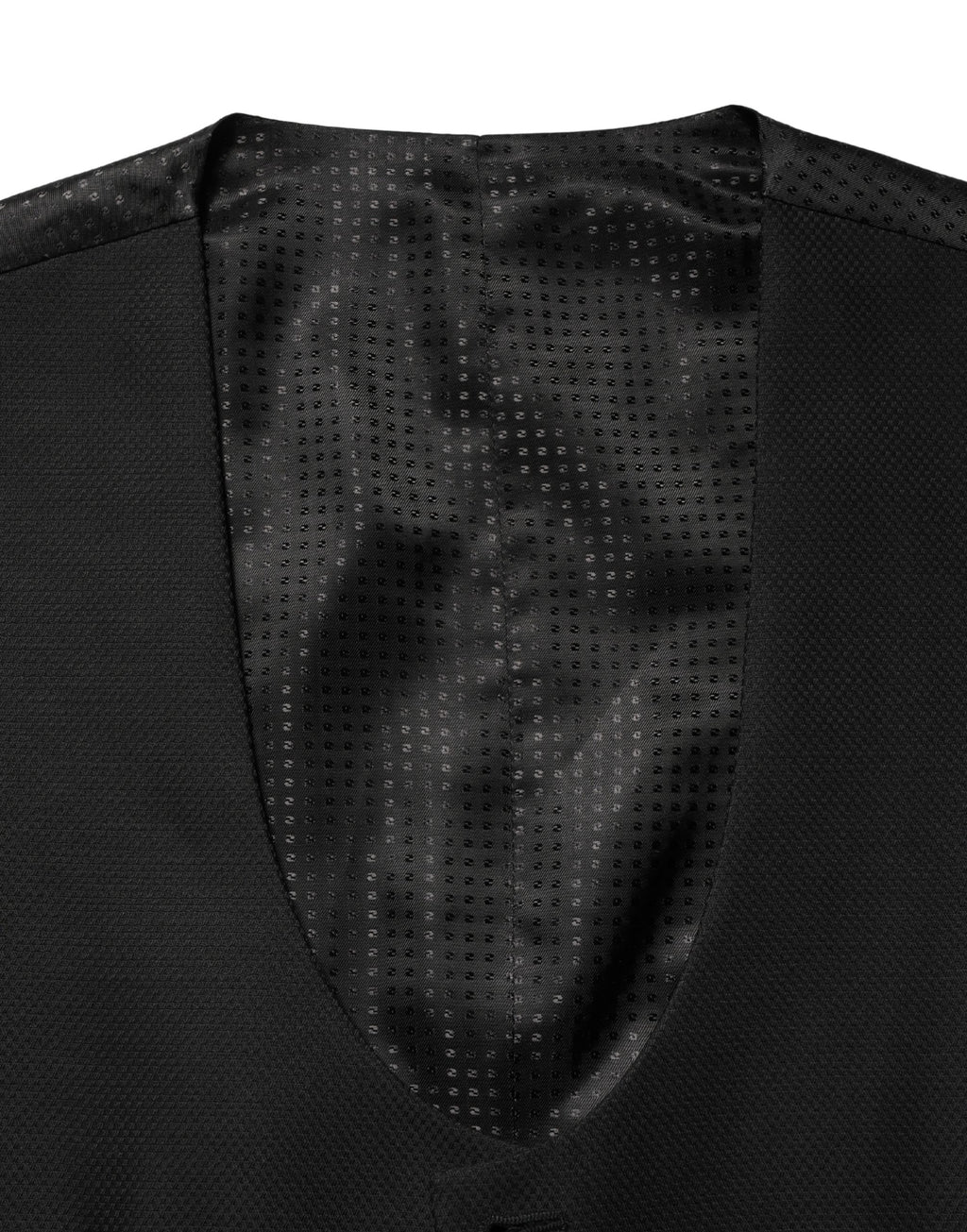 Gilet en laine noire Dolce & Gabbana à manches longues, à col en V et à boutonnière simple, porté sur un mannequin.