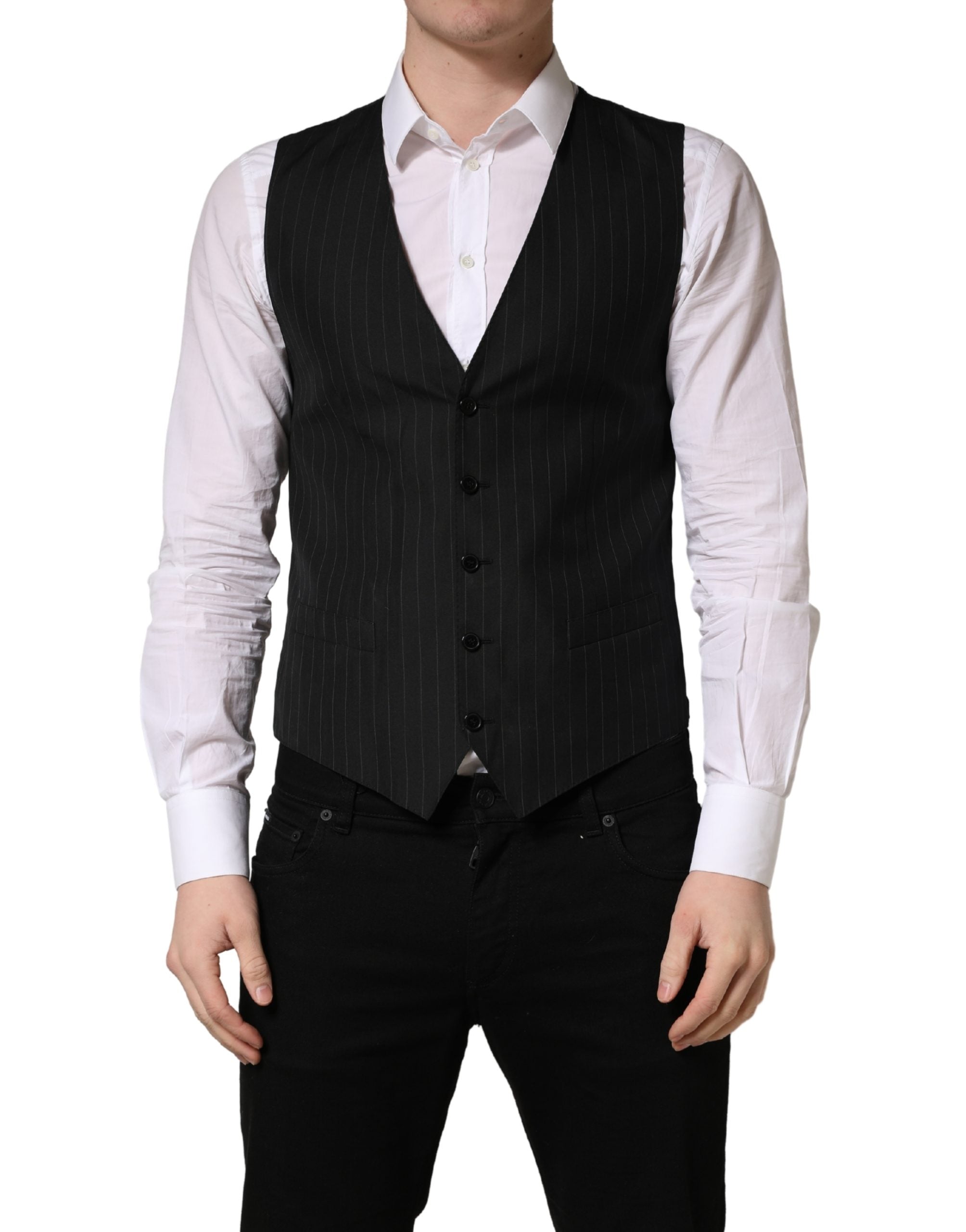 Gilet noir à rayures Dolce & Gabbana, coupe croisée simple, porté sur un fond neutre, détail élégant et moderne.
