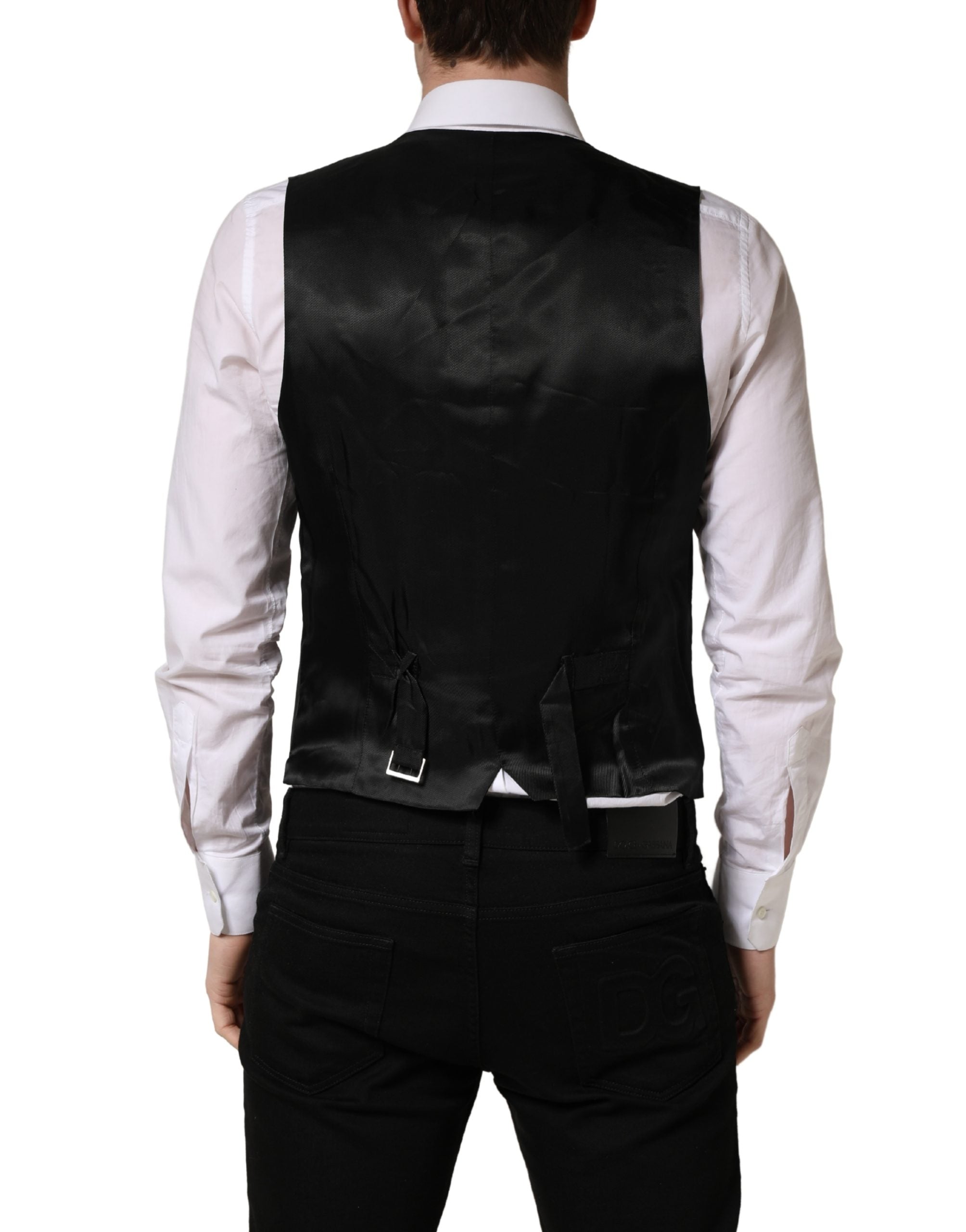 Gilet noir à rayures Dolce & Gabbana à simple boutonnage, vestiaire élégant en tissu fin, porté sur un mannequin.