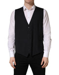 Gilet en laine noir Dolce & Gabbana à simple boutonnage, élégant, ajusté, avec col et poches frontales.
