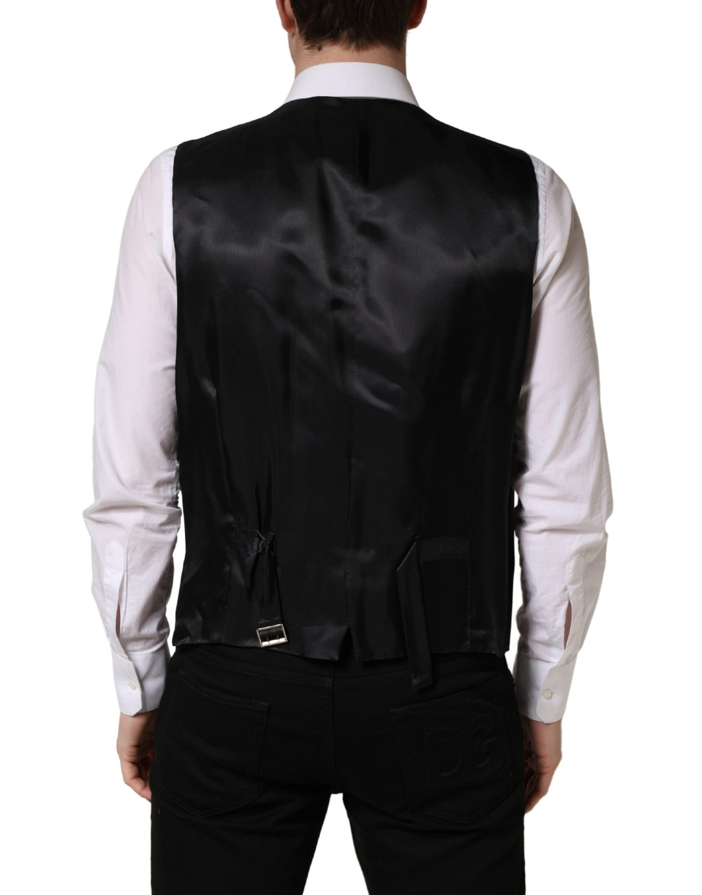 Gilet en laine noir Dolce & Gabbana à simple boutonnage, veste cintrée élégante pour homme.