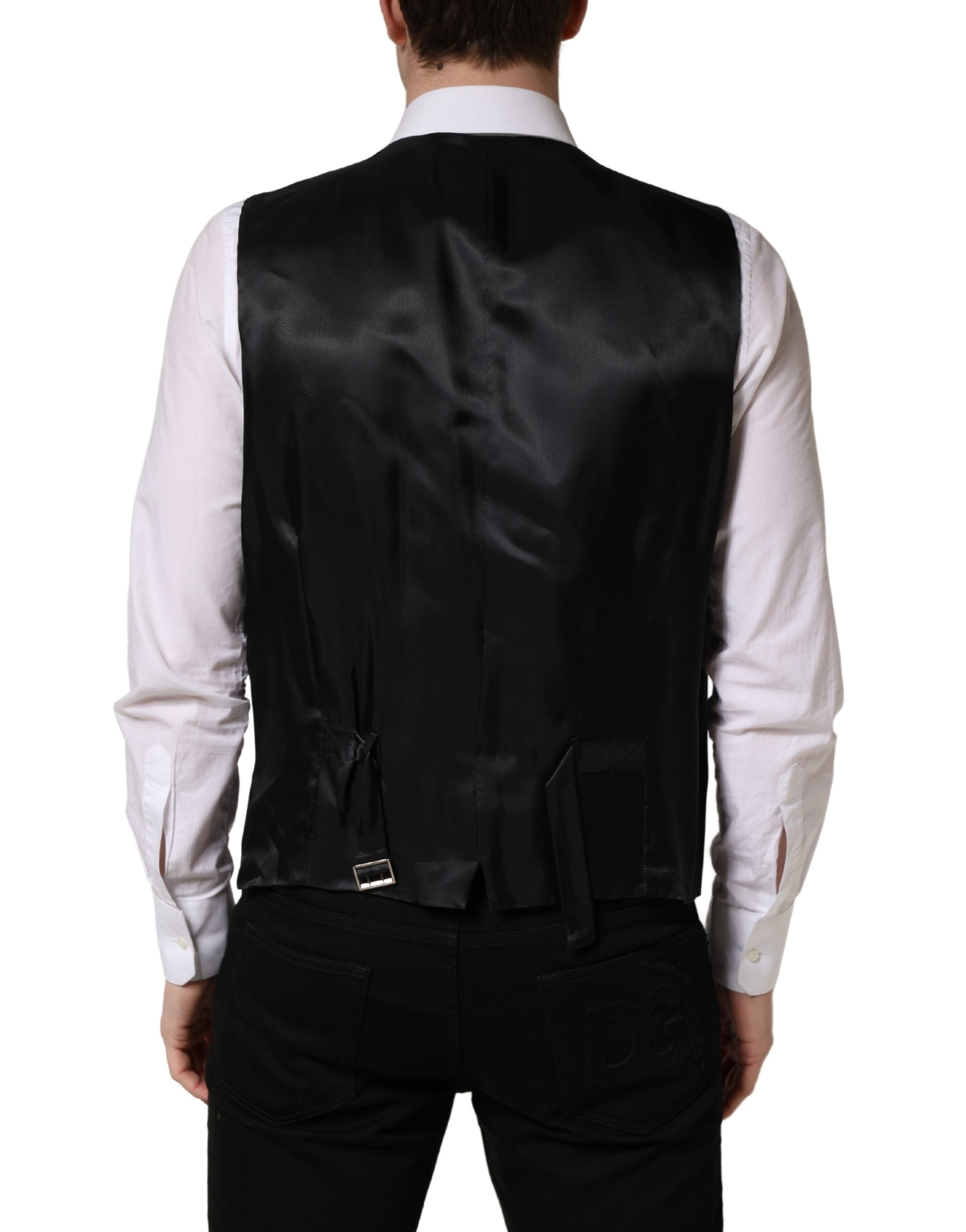 Gilet en laine noir Dolce & Gabbana à simple boutonnage, veste cintrée élégante pour homme.