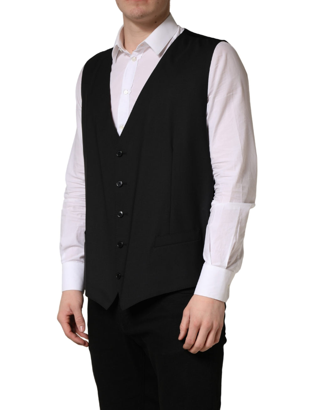 Gilet en laine noir Dolce & Gabbana à un seul bouton, coupe ajustée, détails élégants, porté sur un mannequin.