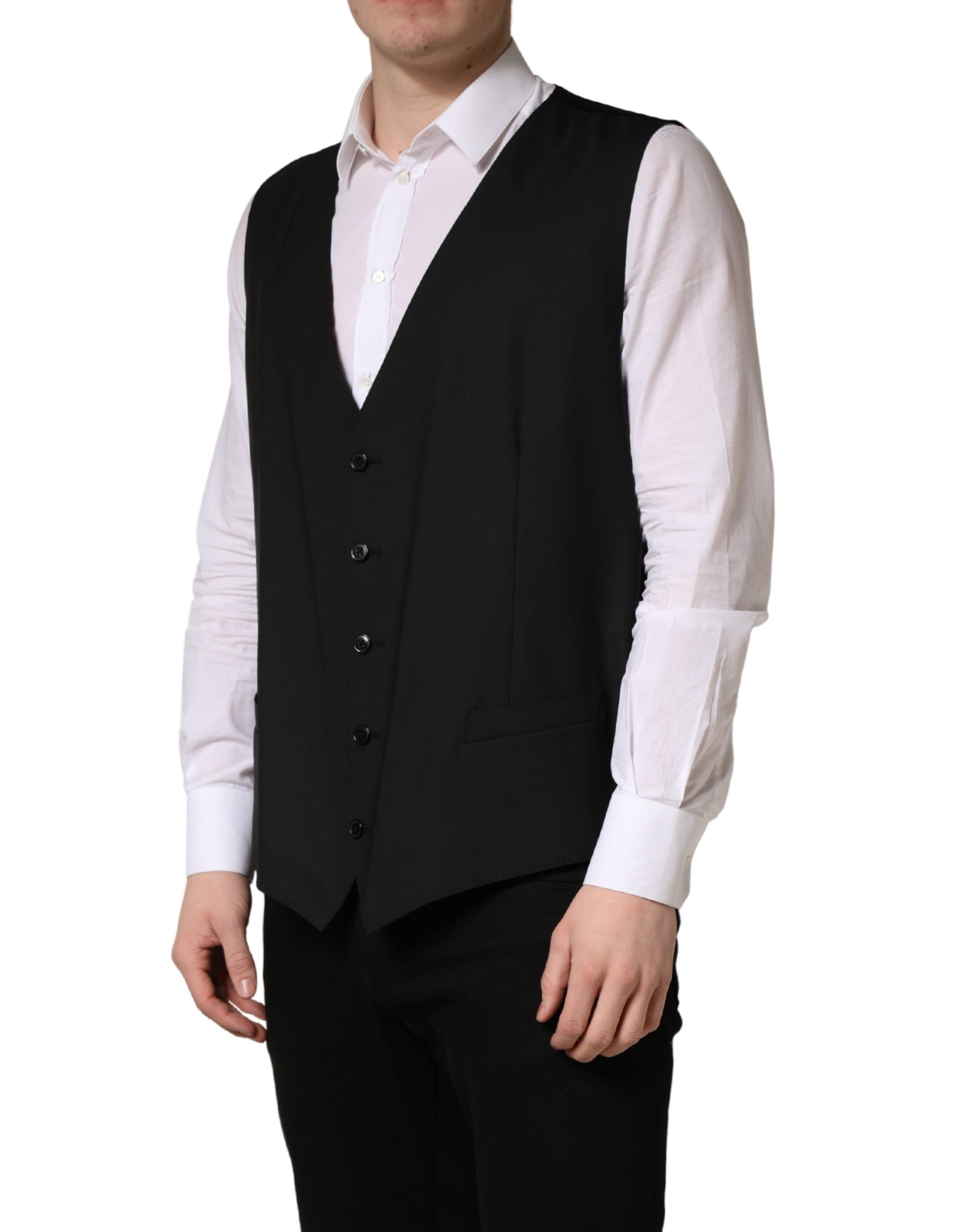 Gilet en laine noir Dolce & Gabbana à un seul bouton, coupe ajustée, détails élégants, porté sur un mannequin.