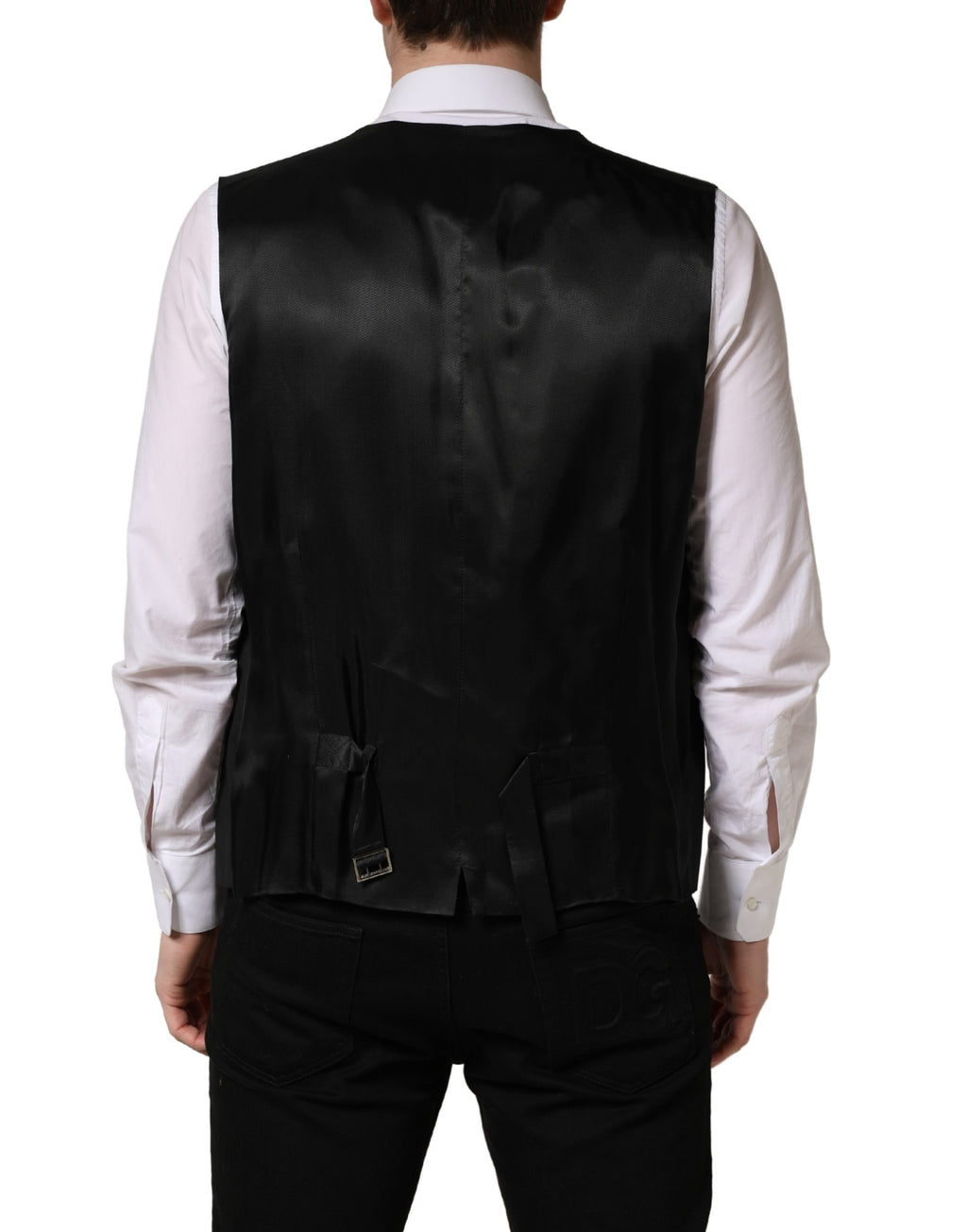 Gilet en laine noire Dolce & Gabbana à simple boutonnage, élégante pièce de vêtement pour homme.