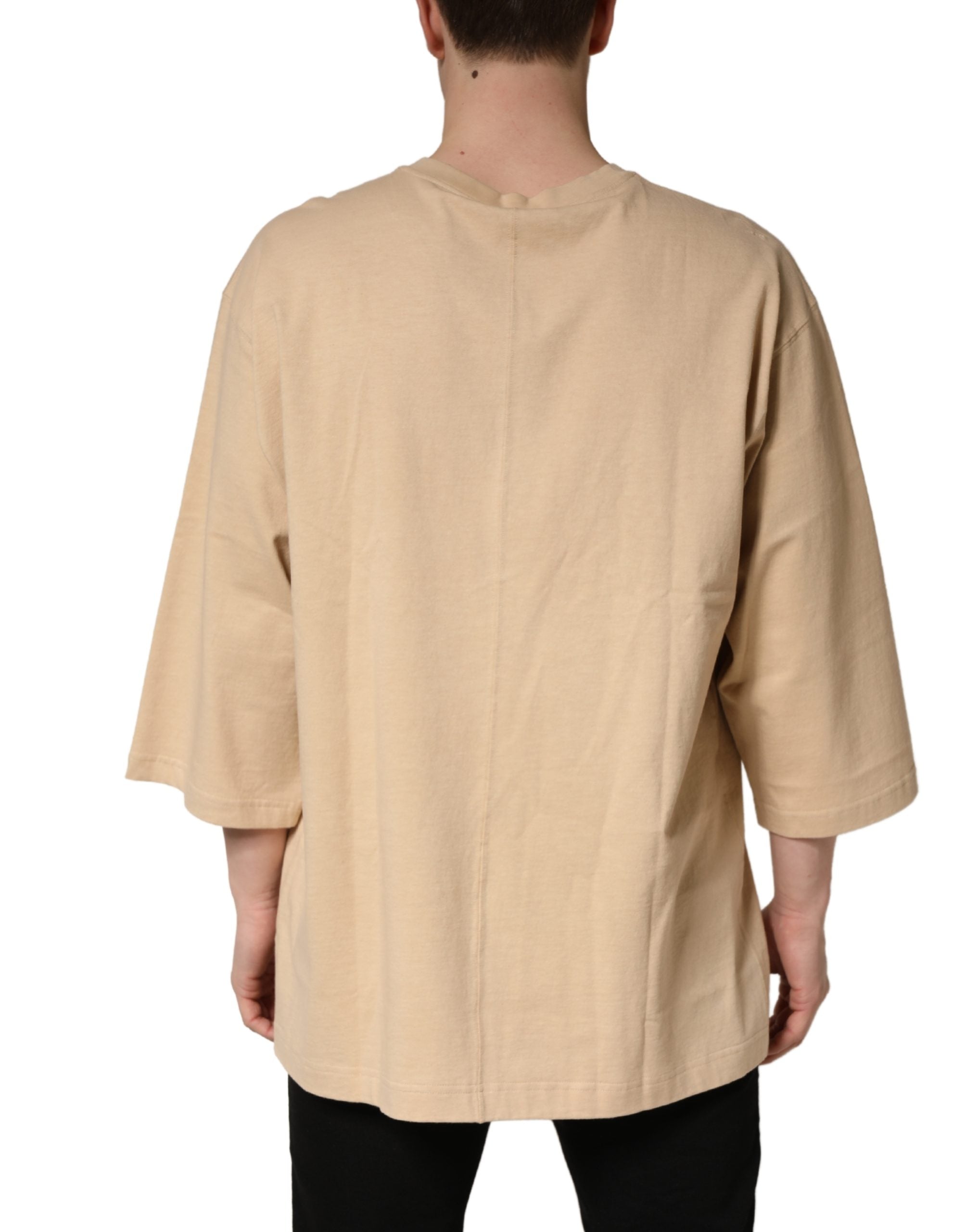 T-shirt beige en coton Dolce & Gabbana à col rond et coupe oversize, vue frontale.